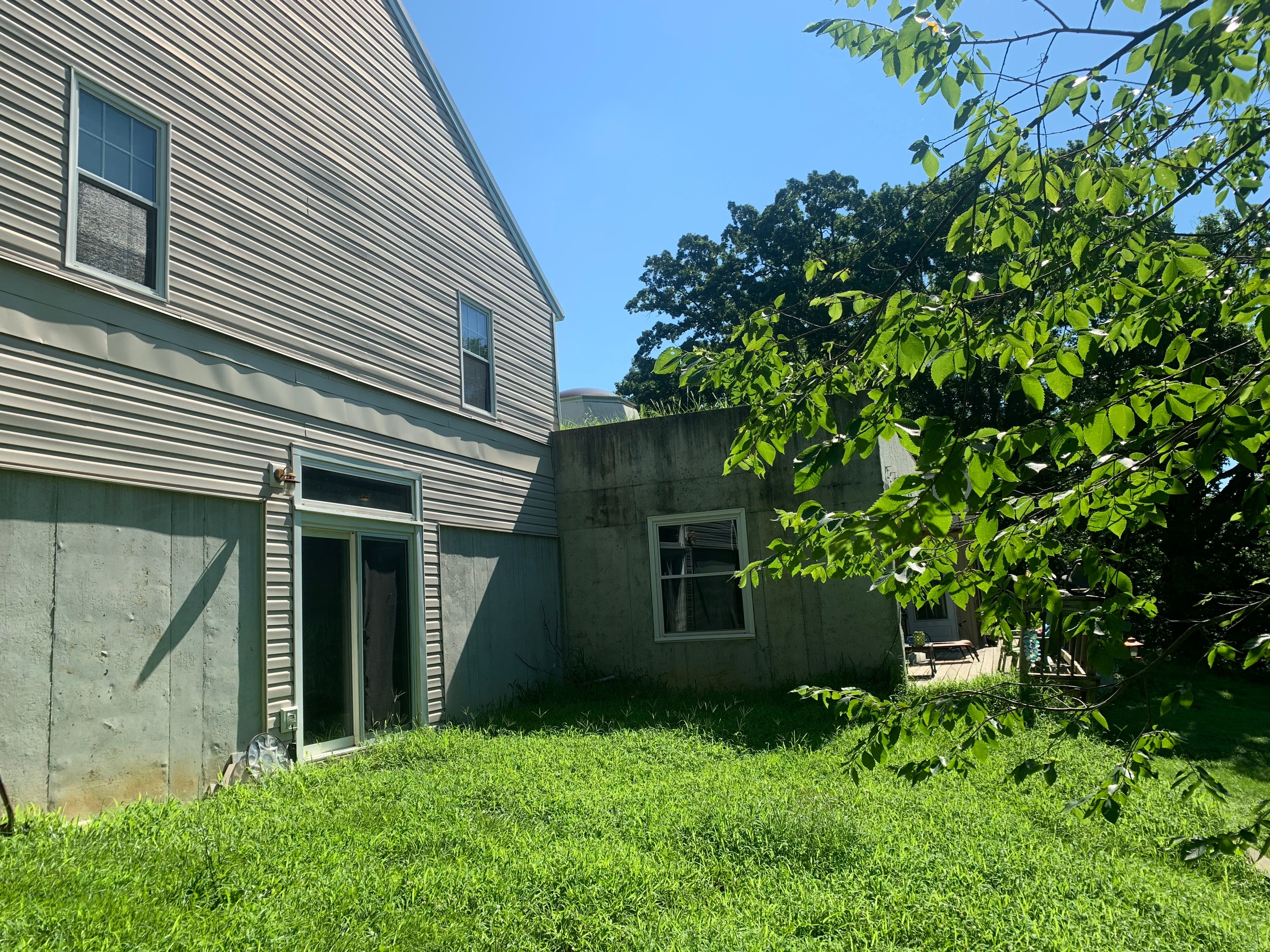 Contemporary house Siding Installation using Mastic Premium Vinyl siding  by EEC  Windows, Siding & Roofing 
