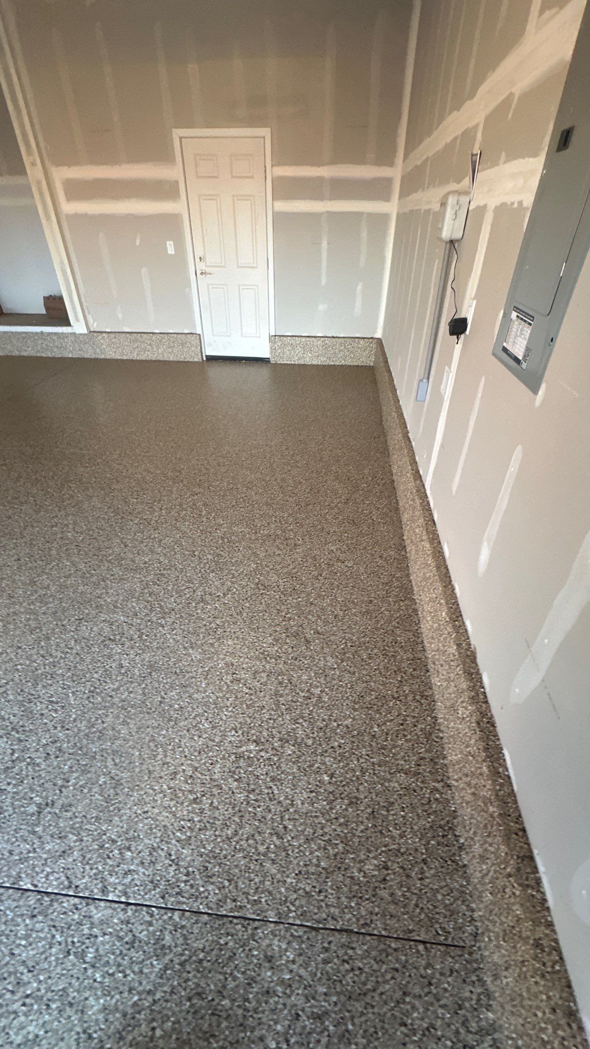 Garage Transformation using Sandstone by Croc Coatings, LLC