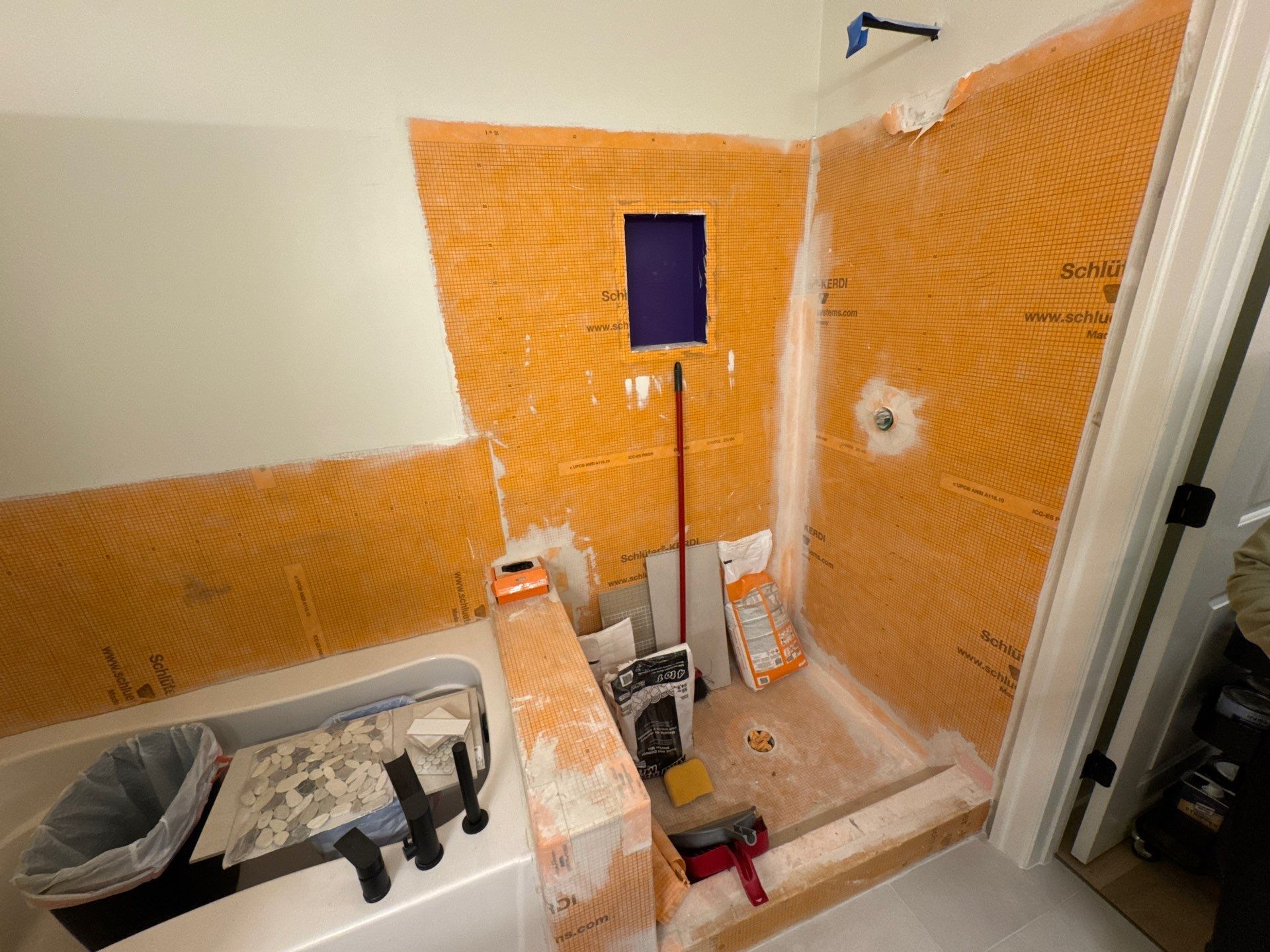Shower and tub tiling  by Prudencio