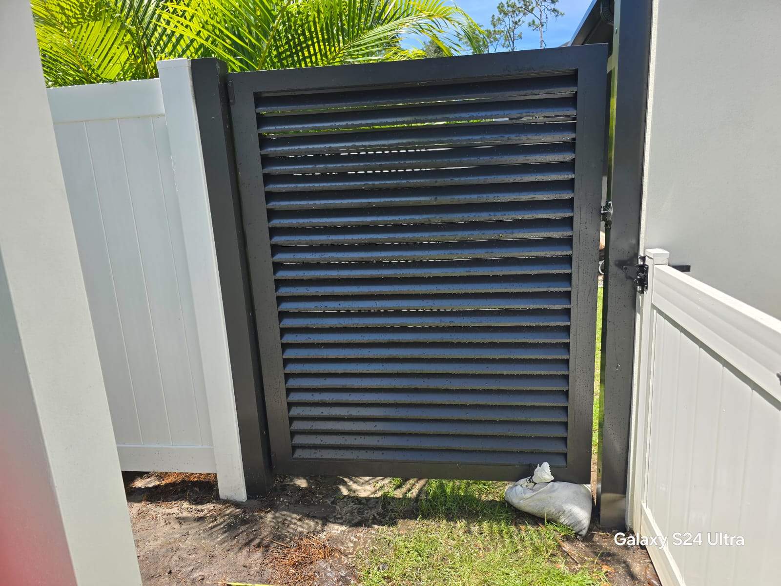 Louvered Aluminum Gates in Osprey by True Fence LLC