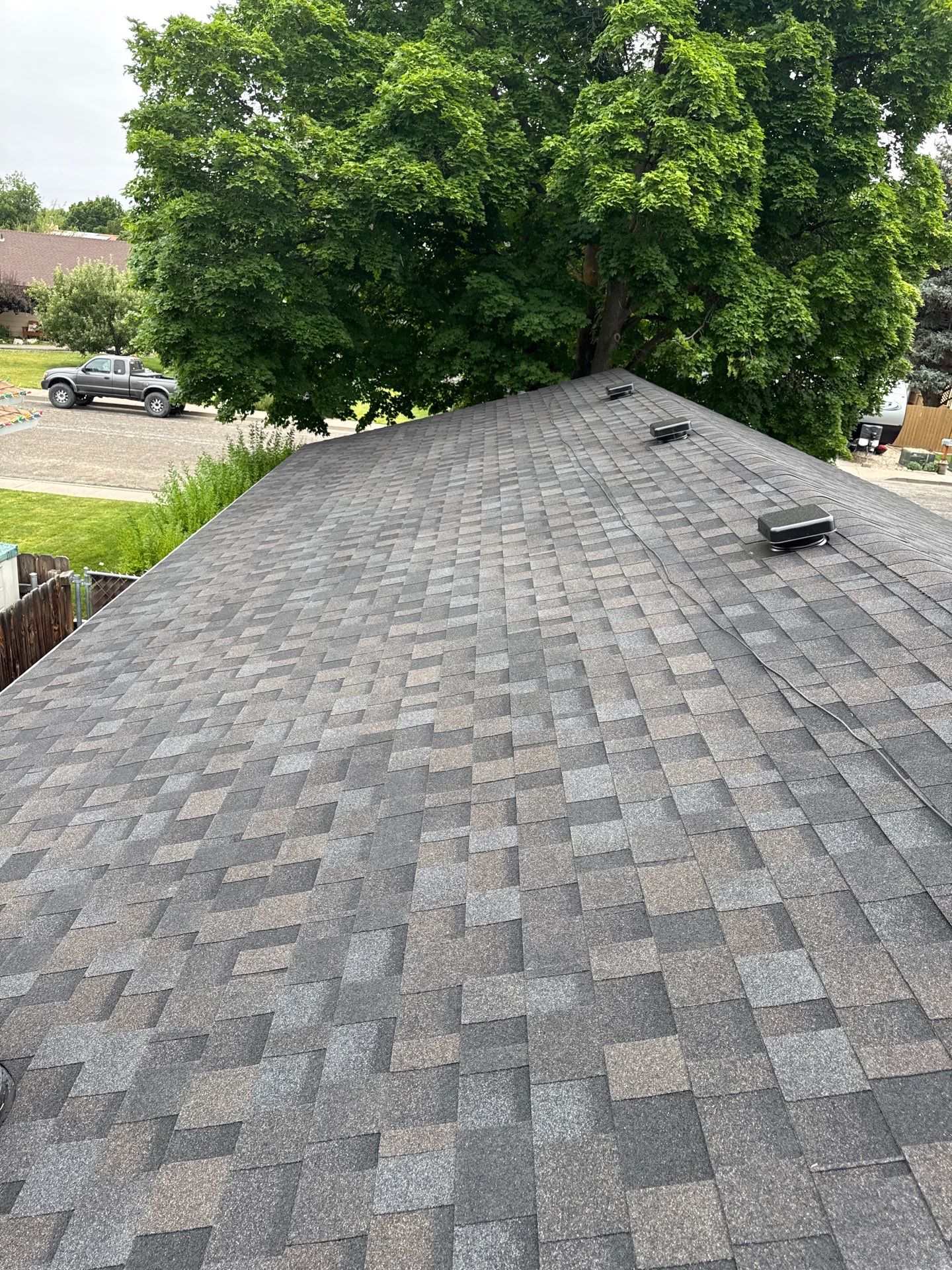 Residential Roof Replacement With Dark Gray Architectural Shingles in Mountain Home by Olive Roofing