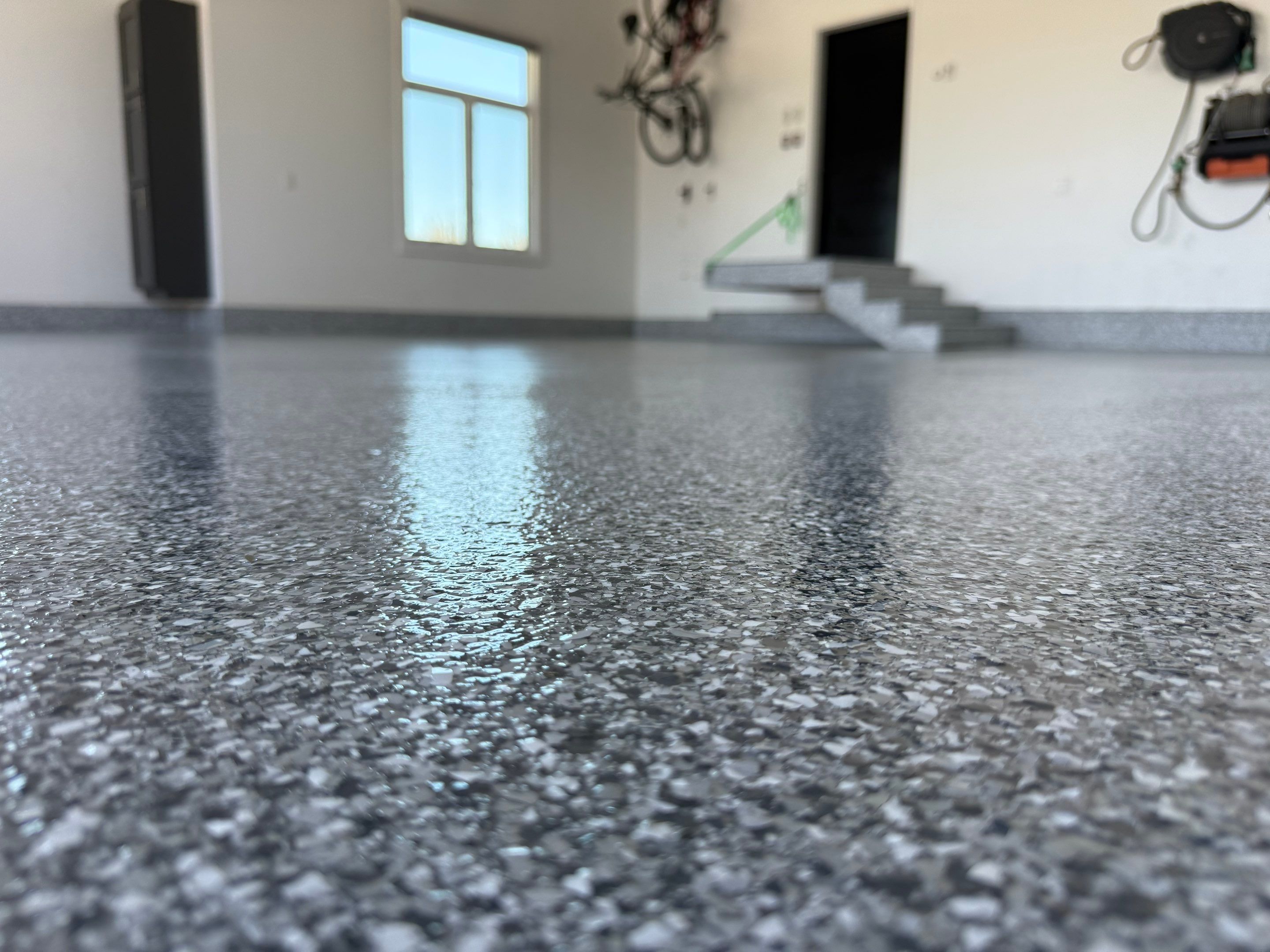 Gravel Flake Garage Floor Coating in Yankton by Select Painting, Coatings & Garage Cabinets