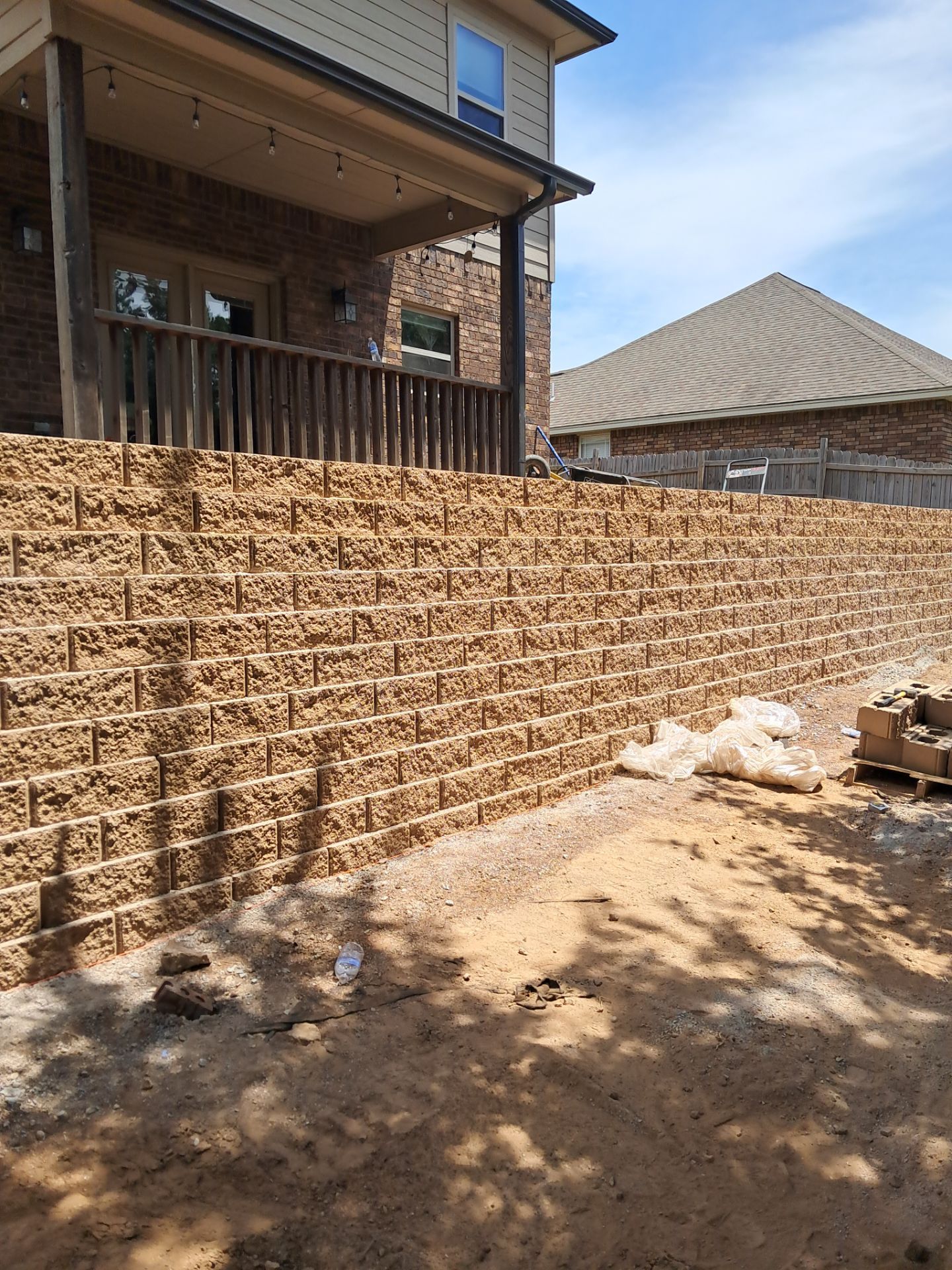 Custom Segmental Block Retaining Wall and Sod Installation in Lawton by Clays Services Inc