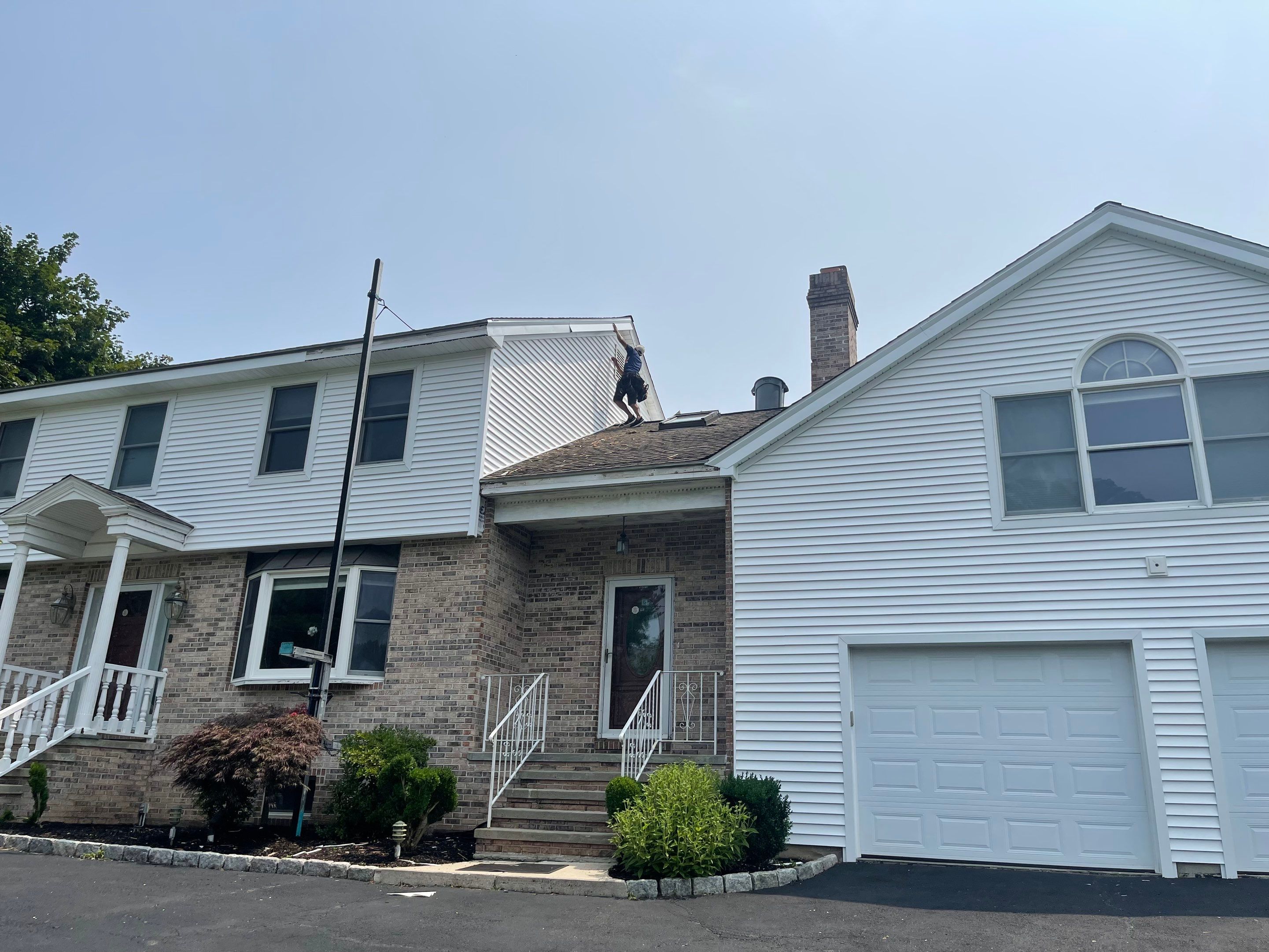 Siding Installation using Mainstreet Colonial & White gutters by A Plus Exterior