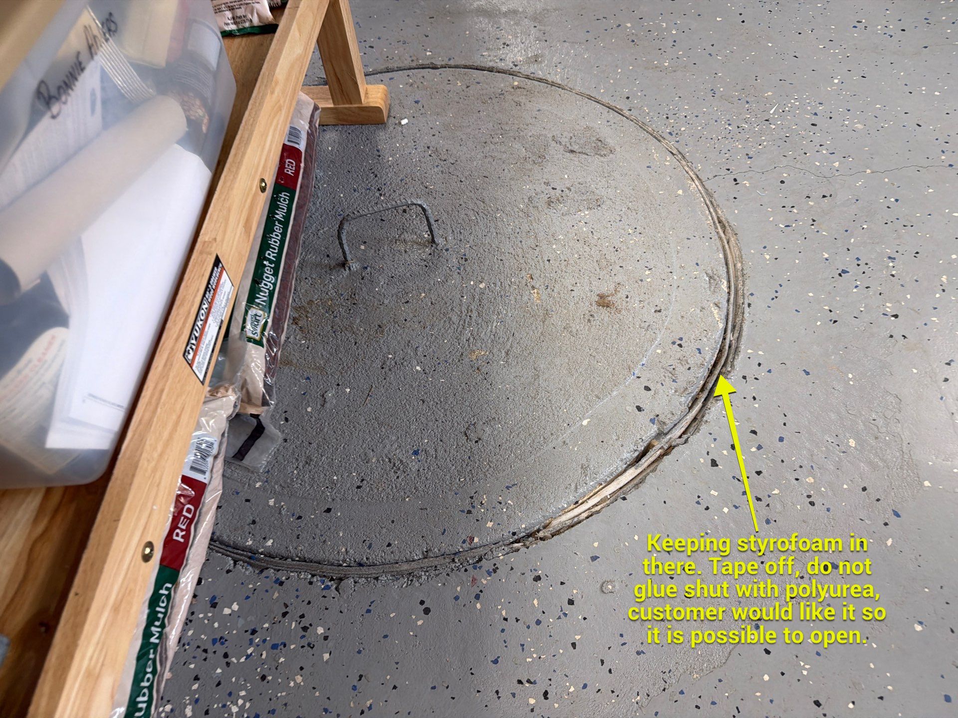 Custom Grey Flake Epoxy Garage Floor Installation in Remsen by Select Painting, Coatings & Garage Cabinets