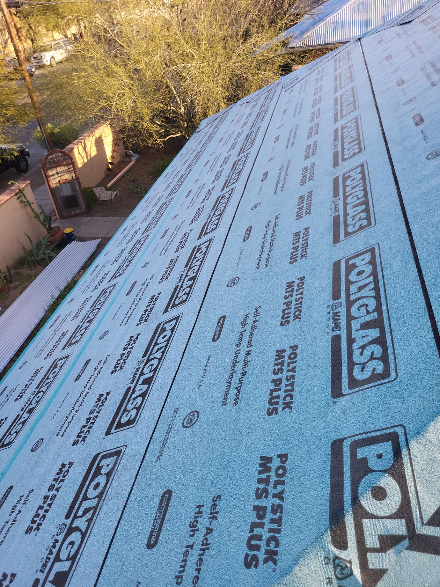 Metallic Silver Exposed Fastener by Reimagine Roofing