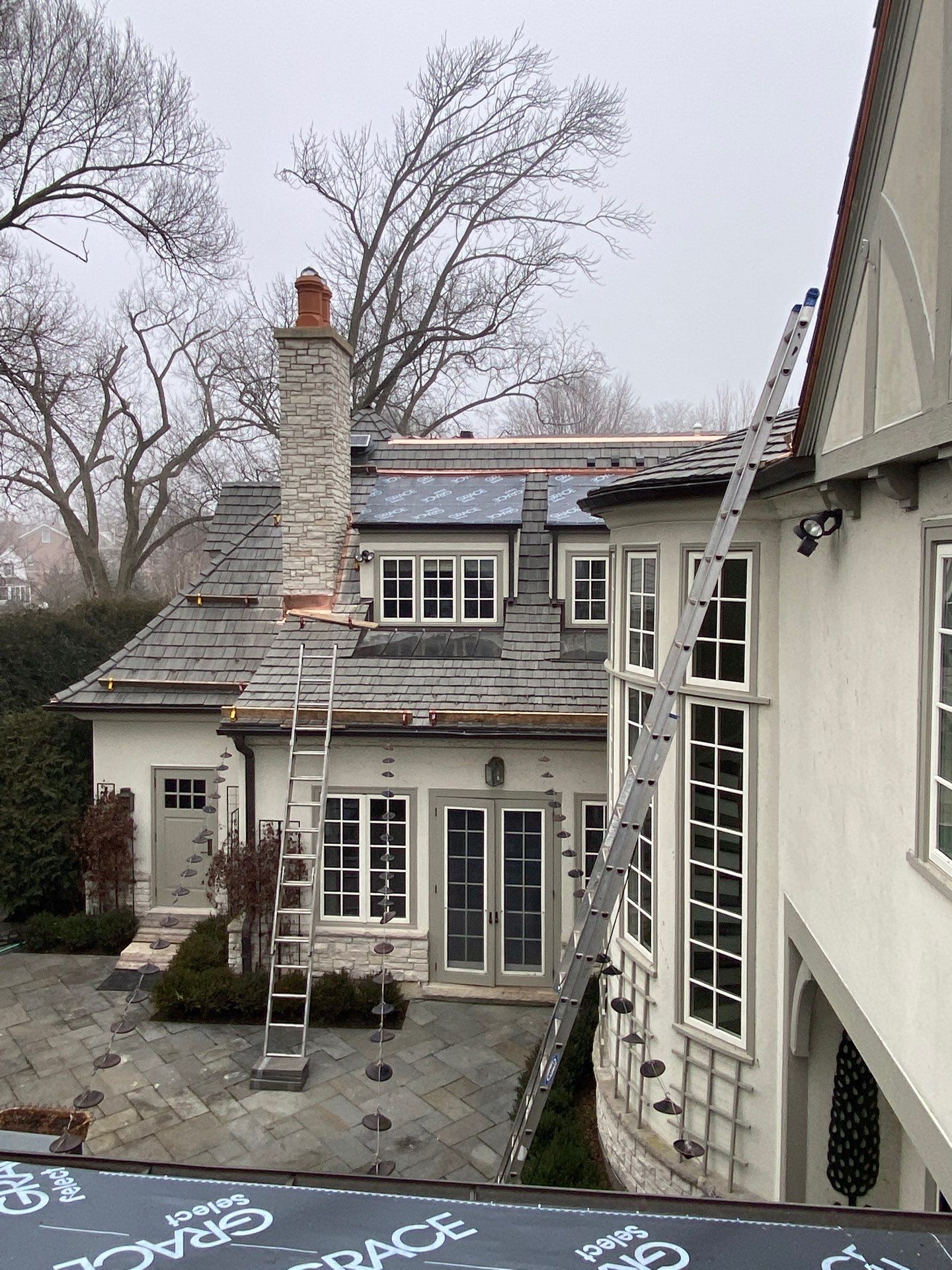 Brava Shake Tile Roof Installment with Copper Flashings by Custom Installations, Inc.