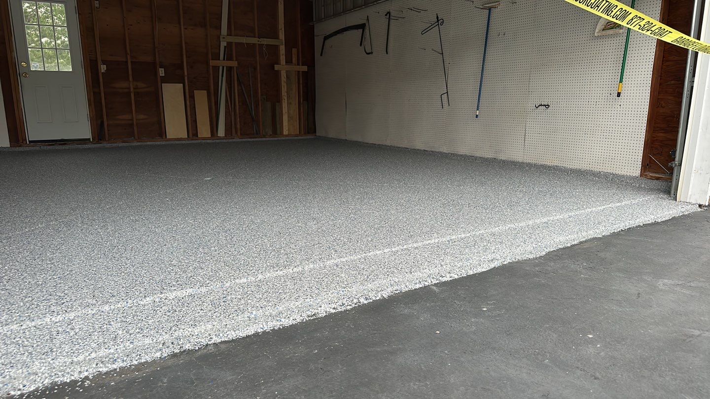 Silverado garage floor and patio coating  by NG Masonry & Construction LLC