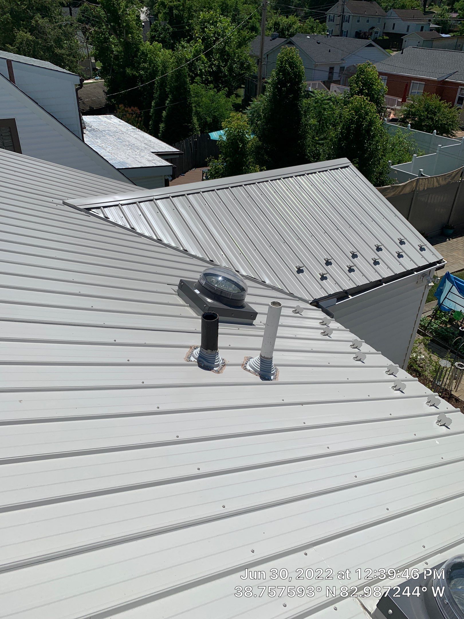 Metal Roofing, Skylights, Porch Build by Secure Construction Company Inc