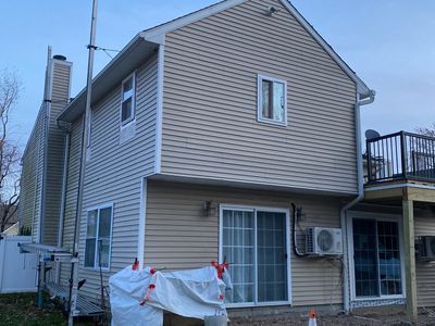 Siding Repair using Certainteed Mainsteet D4 and EPDM roof under deck
