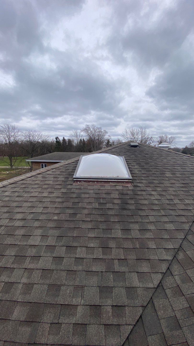 Asphalt Roof Replacement and Aluminum Gutter Installation by Custom Installations