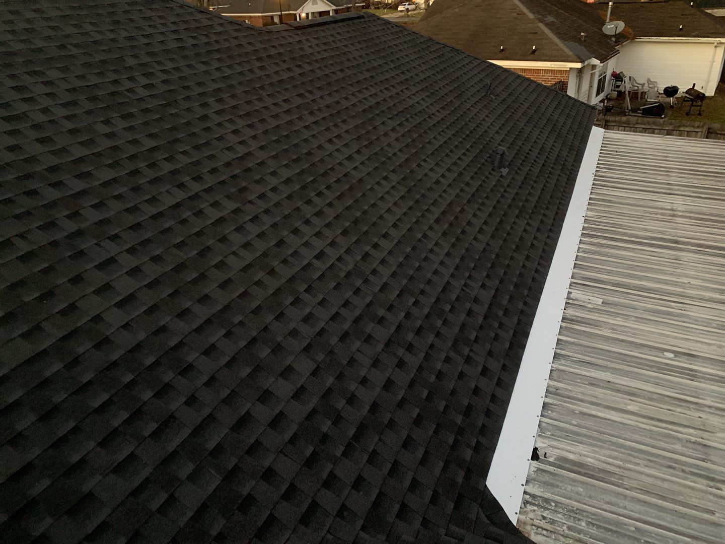 Residential Roofing Installation using Roof Replacement by American Roofing & Construction LLC