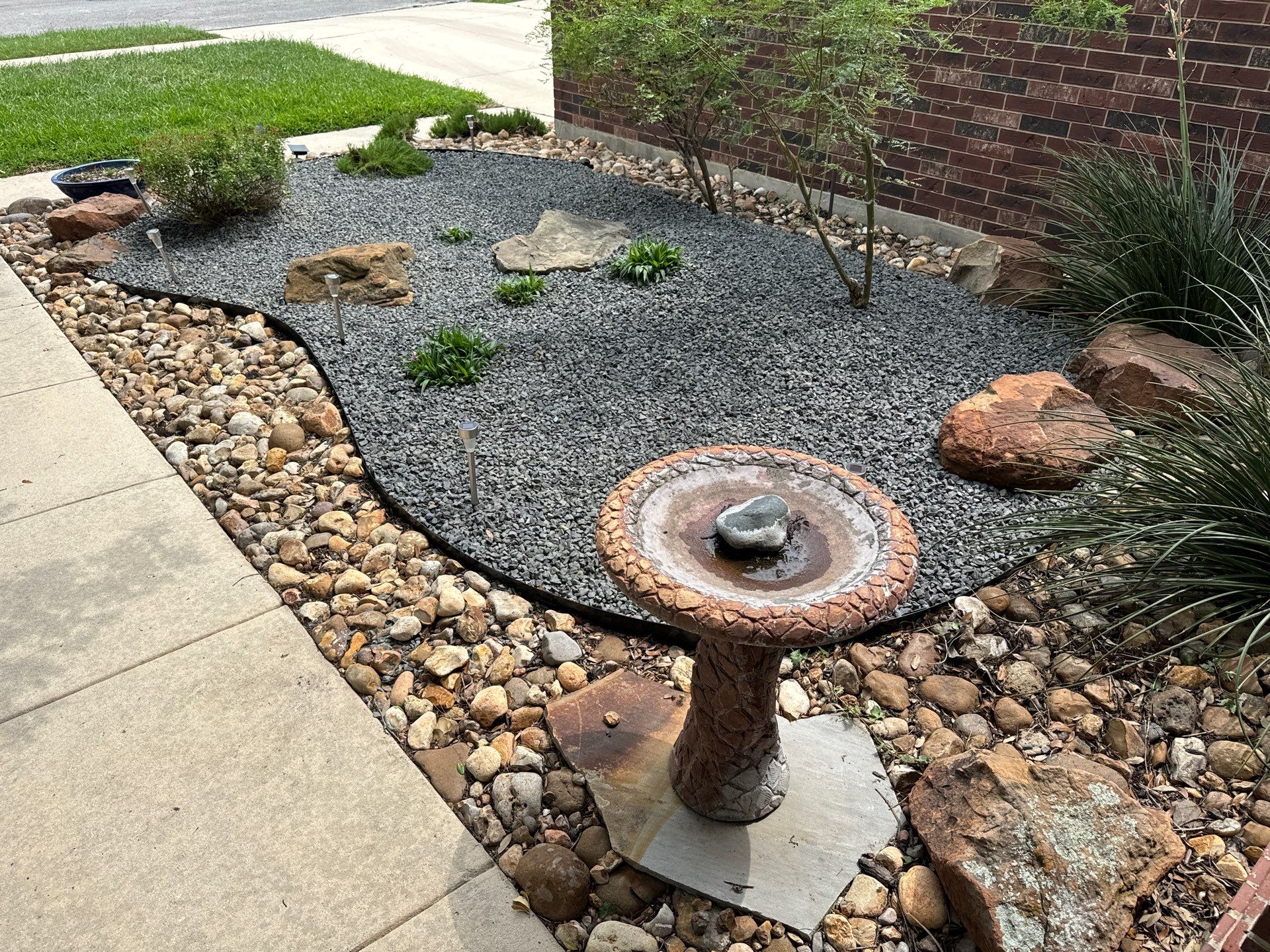 Landscaping Enhancement  using Texas Black Gravel by Hole In One Lawns, LLC