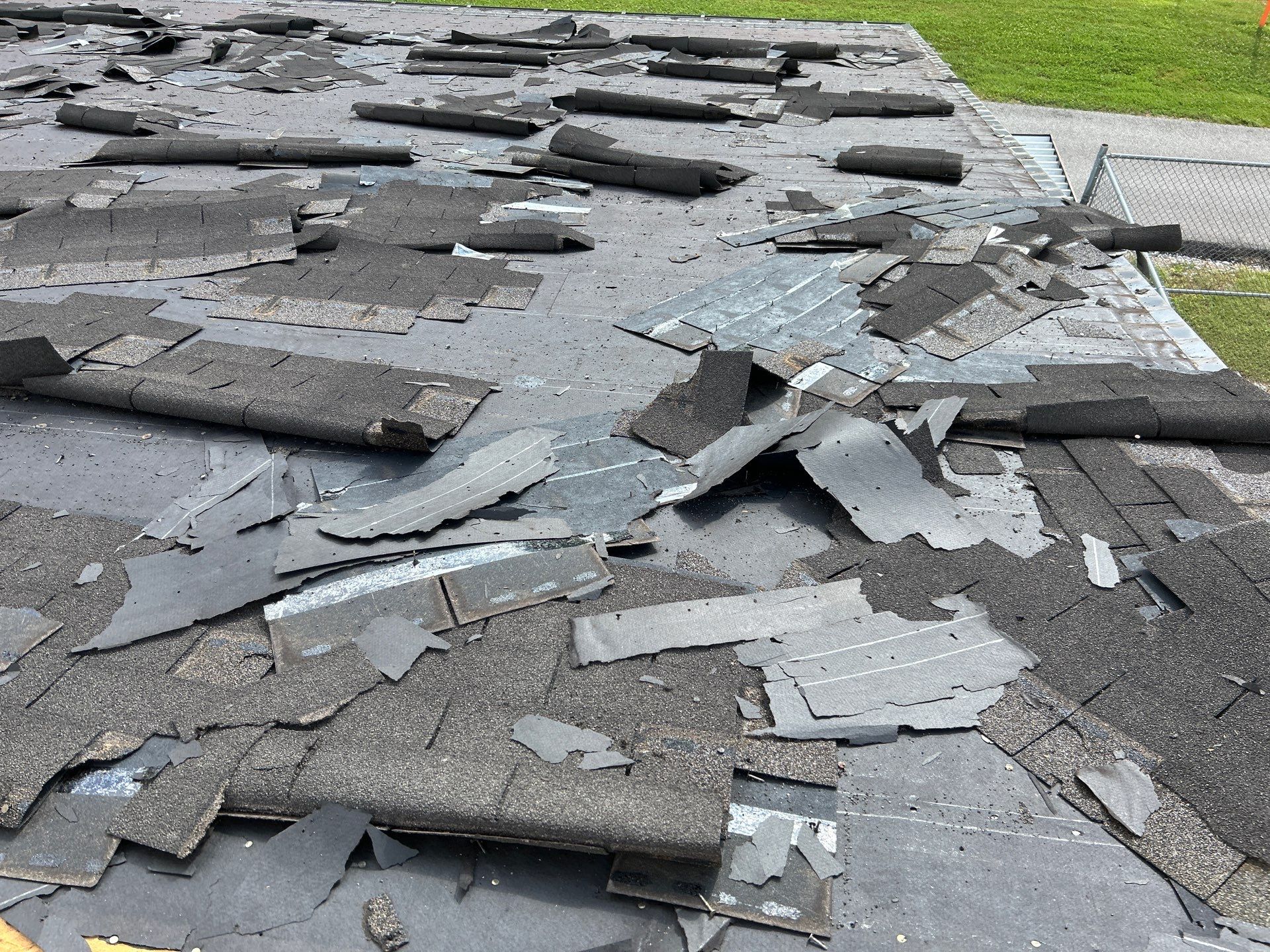 Commercial Roofing Installation using Performance Shingles by Mr. Roofer