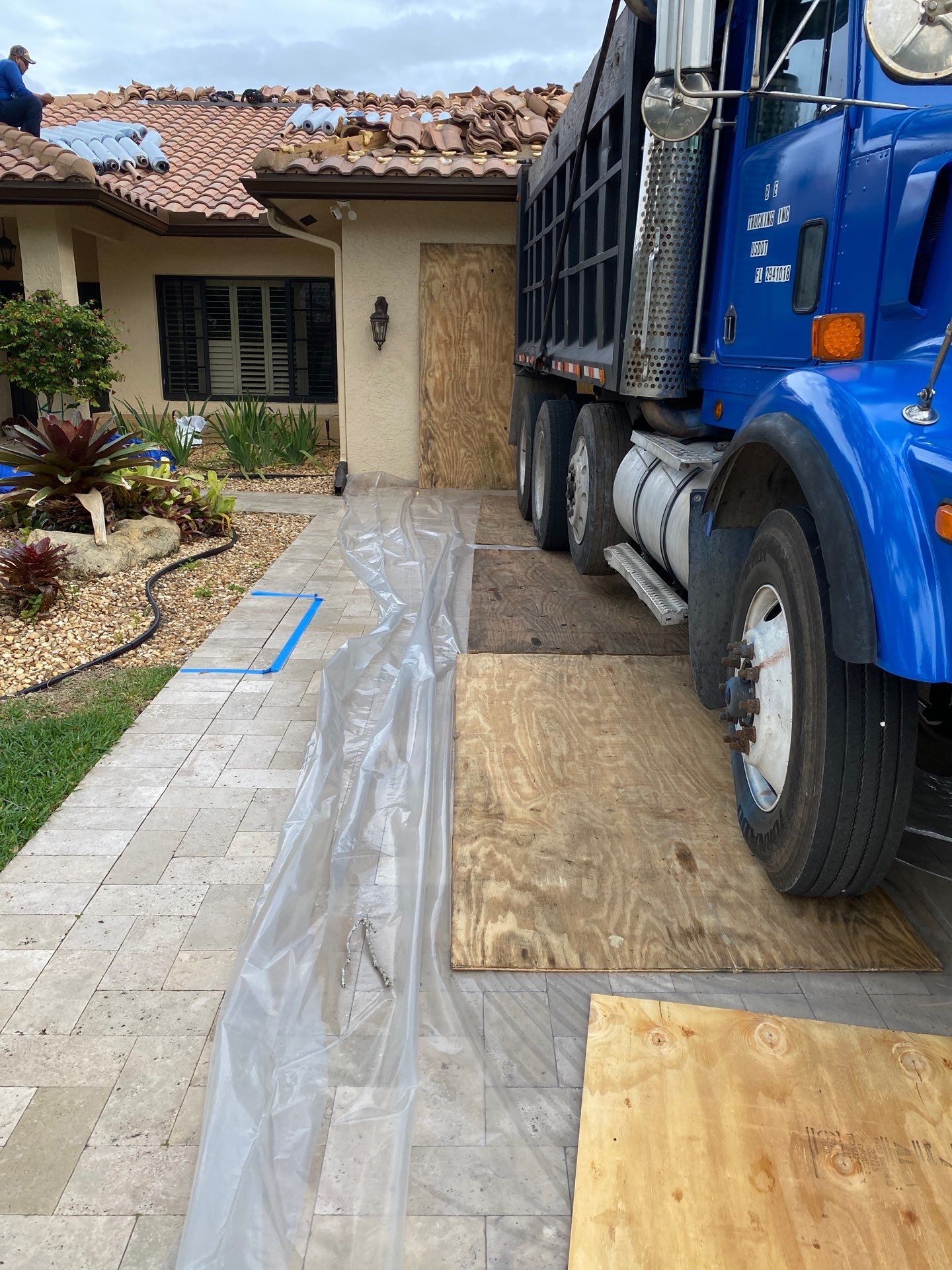 Residential Roofing Installation using 1" Nail strip metal roof by BLUES BROTHERS CONSTRUCTION CORP