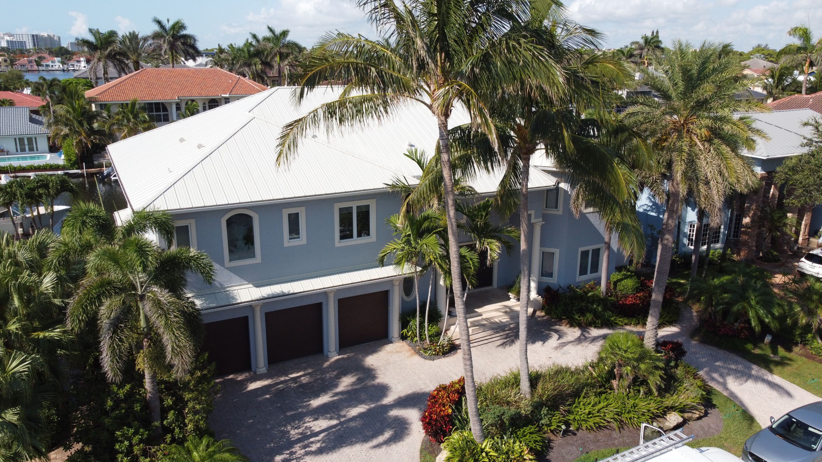 Residential Roofing Installation using 1" Nail strip metal roof by BLUES BROTHERS CONSTRUCTION CORP