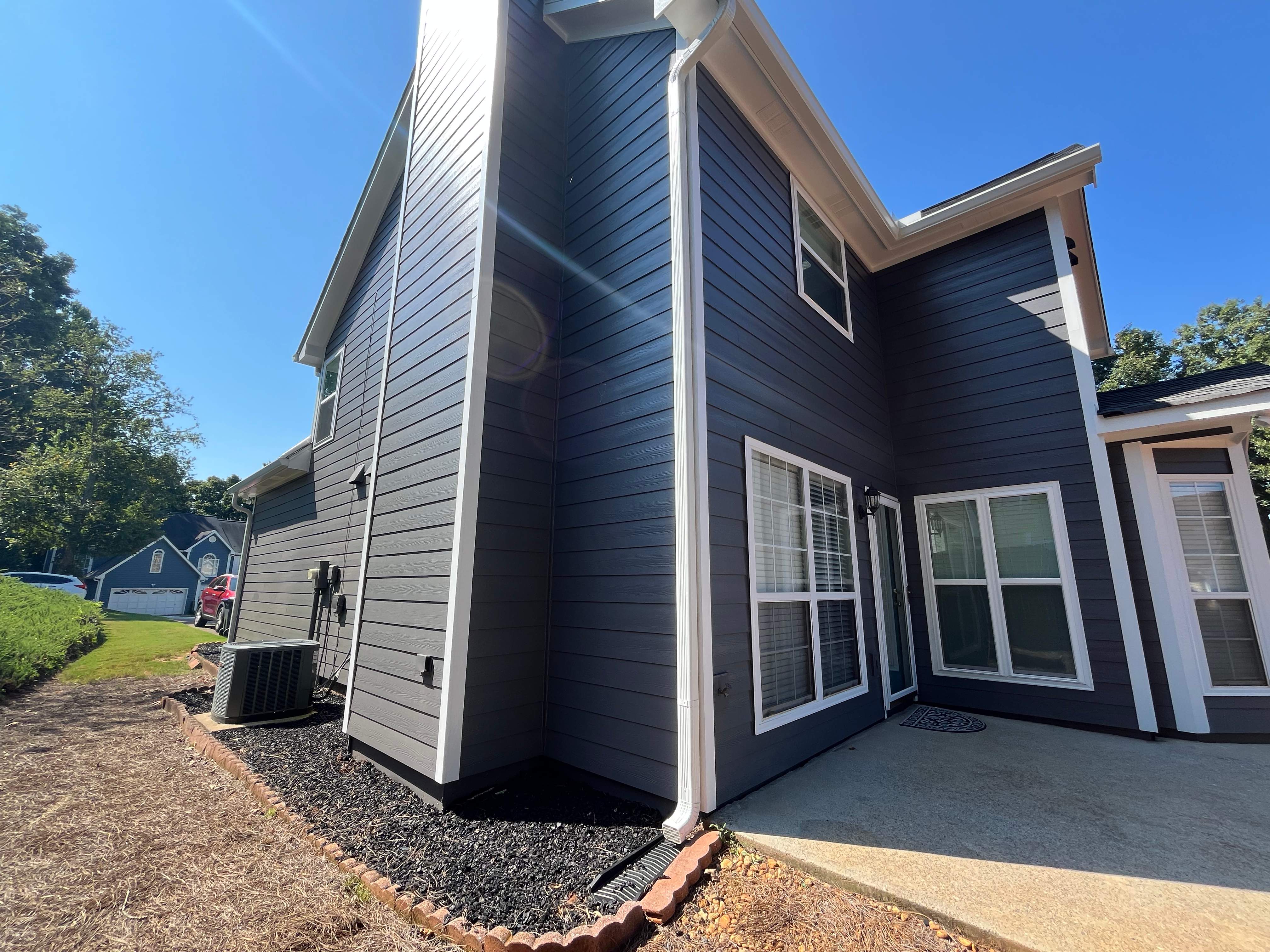 Lawrenceville, GA Full Siding Replacement, Exterior Painting, and Window Installation by Nelson Exteriors 
