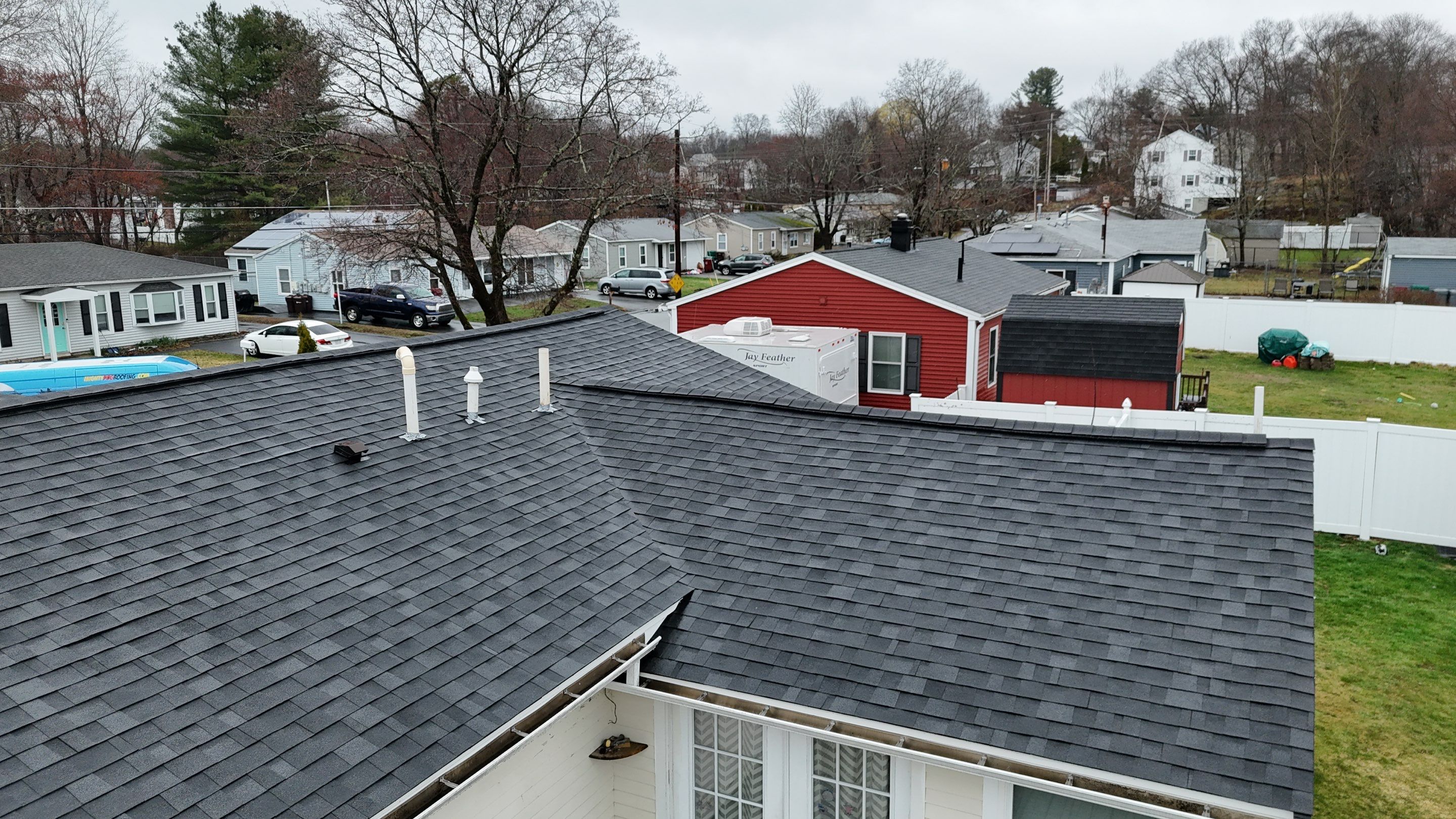 Full Roof Replacement & Complete PVC Trim System in Lowell, MA by Mighty Dog Roofing of Greater Middlesex County