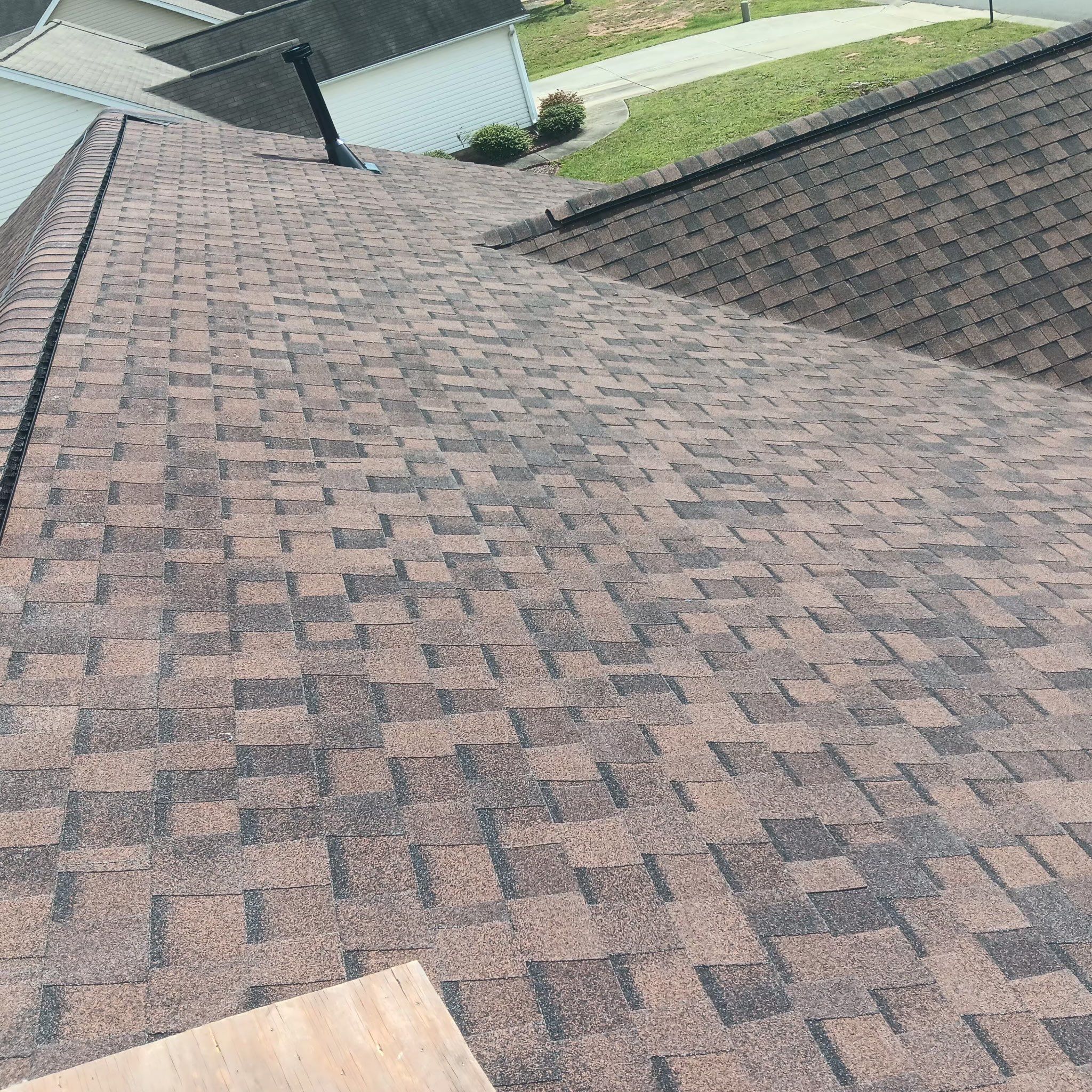 Burlington Residential Roof Replacement with Brown Architectural Shingles by The Remodeling Company