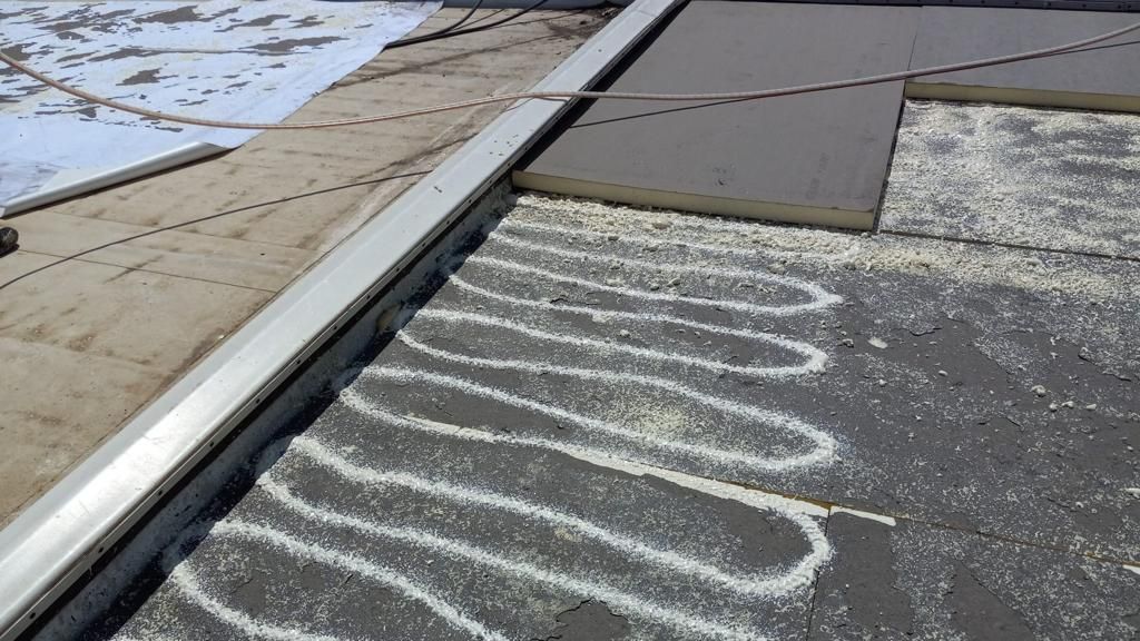 AML Riverside  by Grell Roofing, LLC