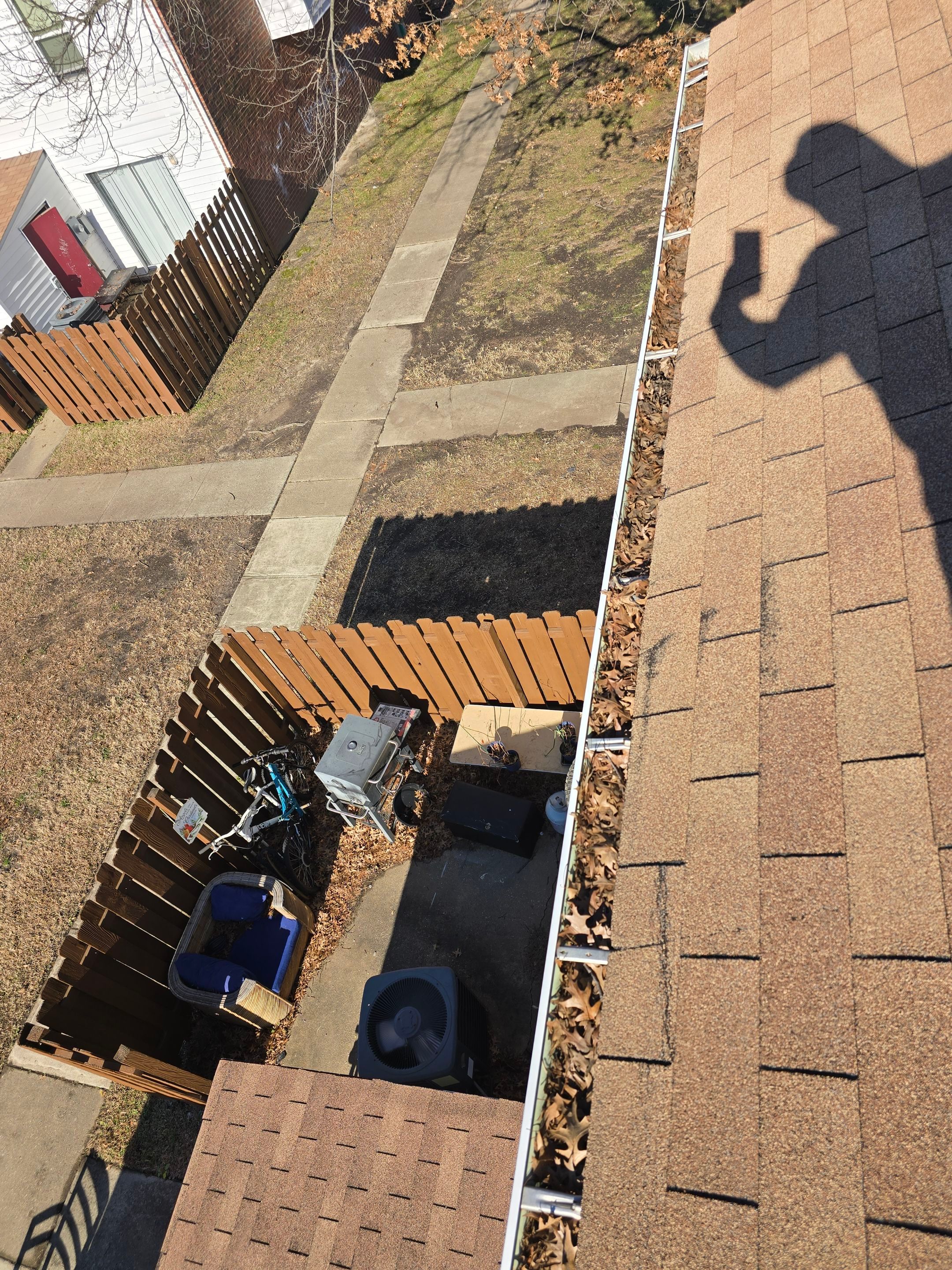 Commercial gutter cleaning Newport News & Hampton, VA	 before photo with filled gutters