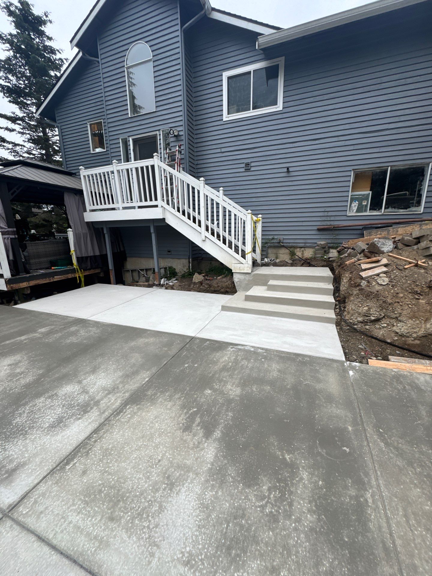 Concrete Back Patio Makeover  by Jireh Asphalt & Concrete Inc 