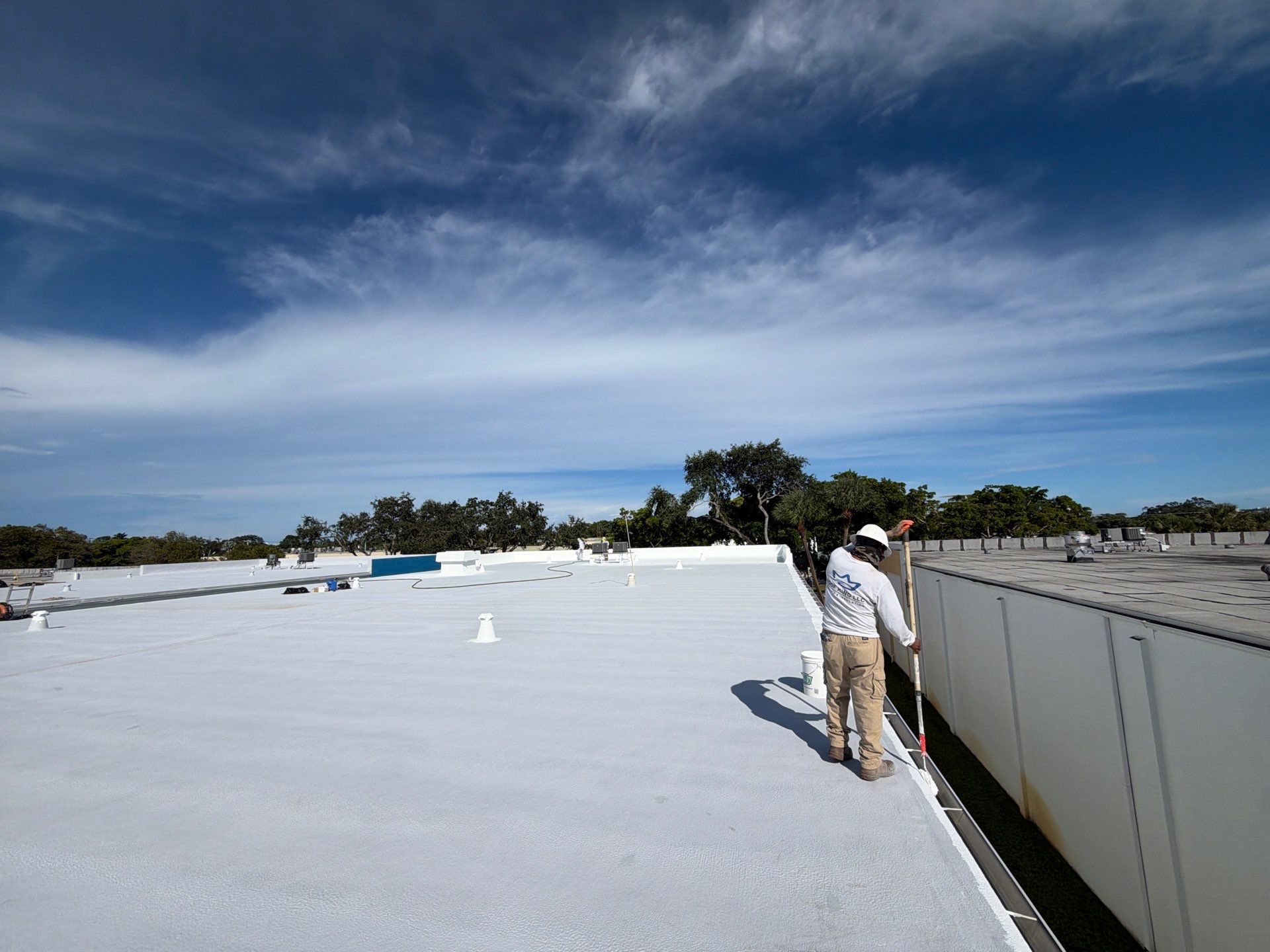 Fort Lauderdale Commercial Roof Restoration with Spray Foam and Silicone Coating by Roof King LLC