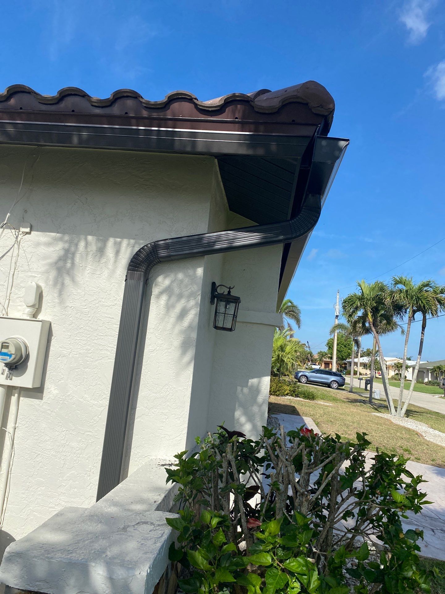 Black Seamless Gutters for Modern Homes in Punta Gorda by Gutter Professors