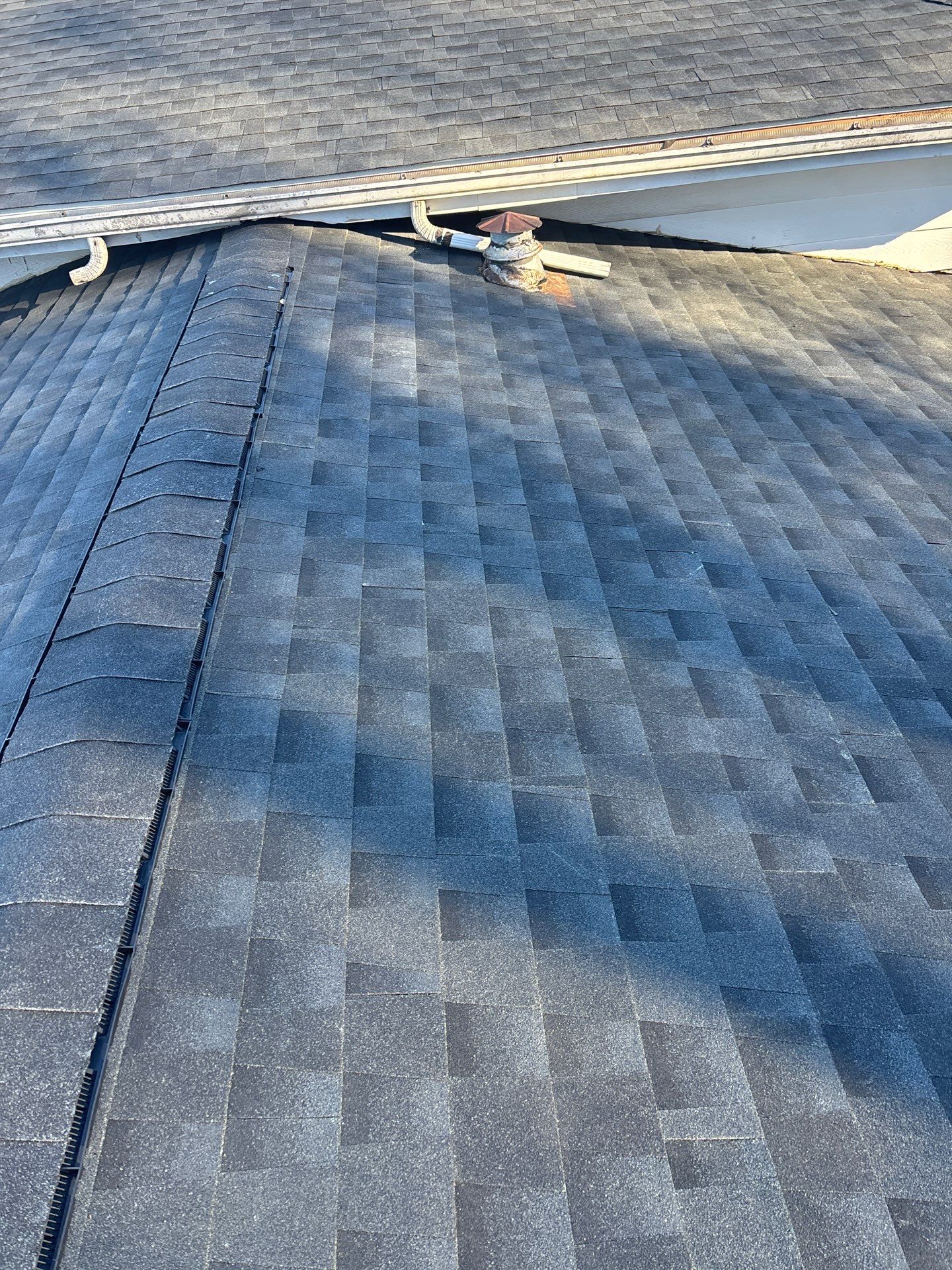 Residential Roofing Installation using GAF Timberline HDZ Charcoal by Rainstoppers Roofing