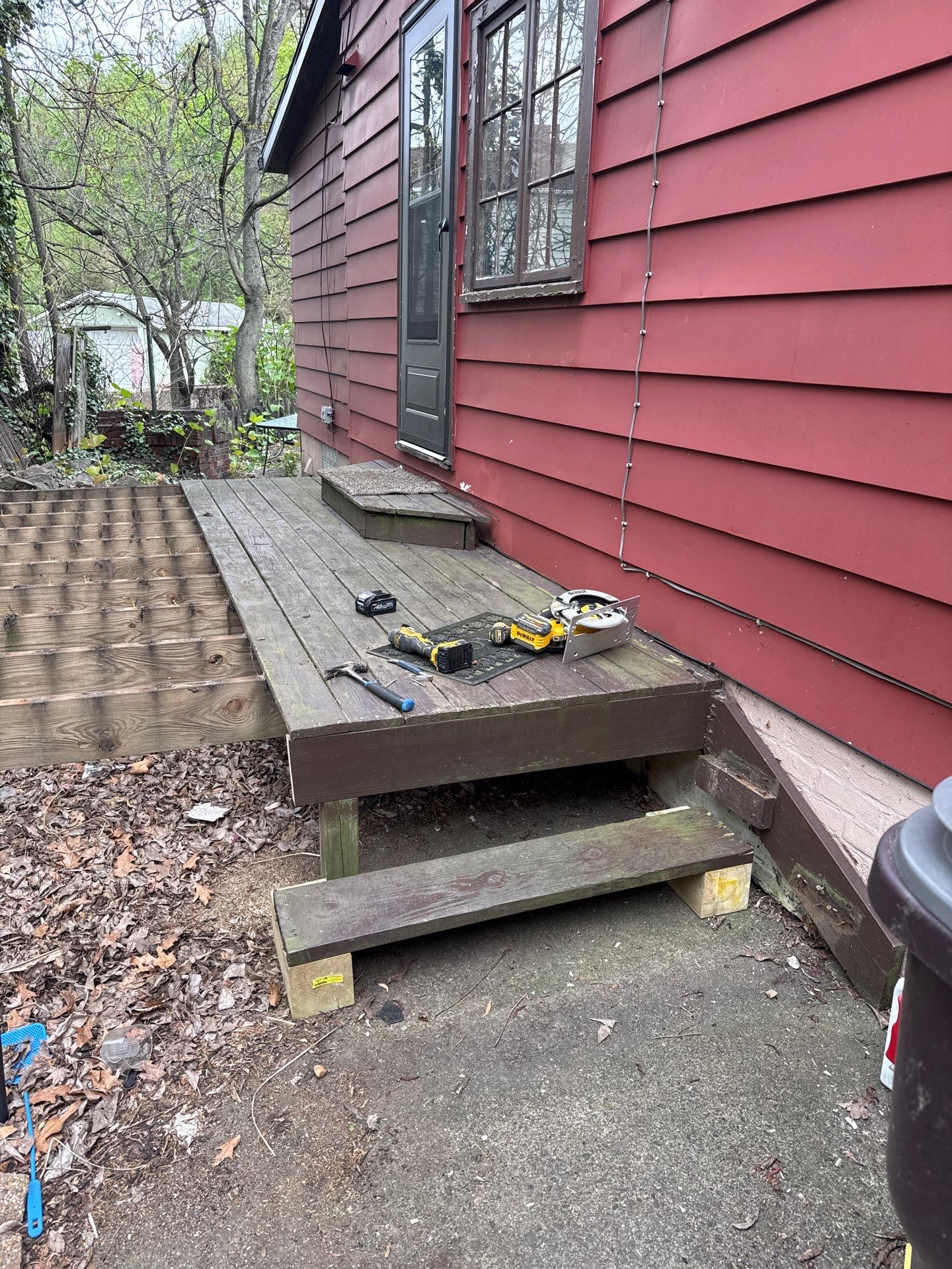 Roof sunspace deck  by Cousins Roofing Siding & Decks