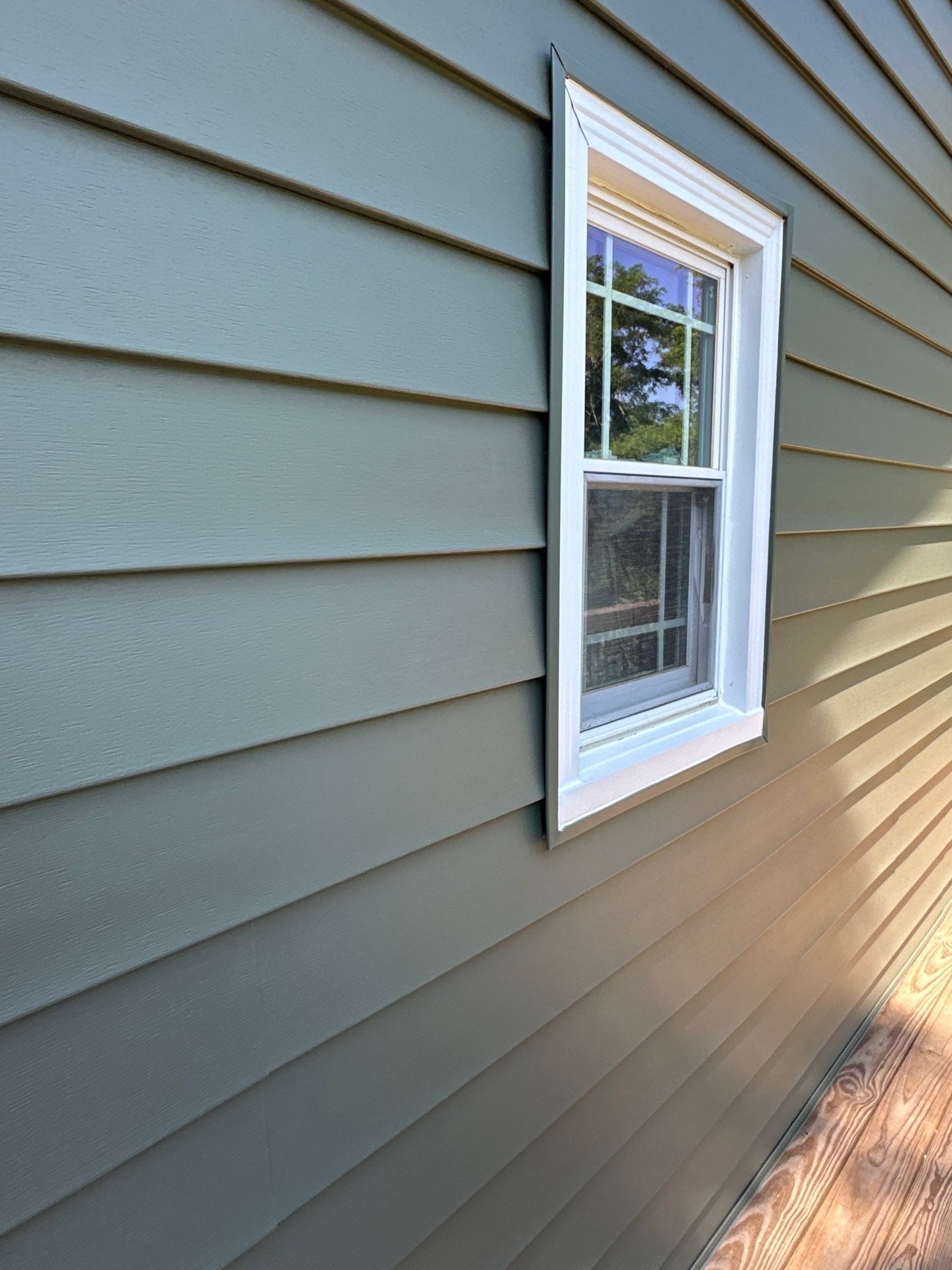 New Craneboard Siding on this Platte City, Mo home  by EEC  Windows, Siding & Roofing 