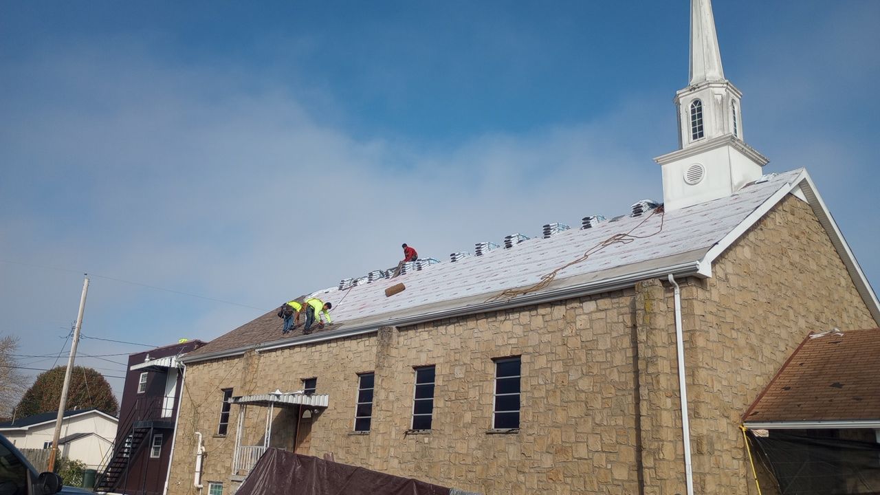 Commercial Roofing Installation using Performance Shingles by Mr. Roofer