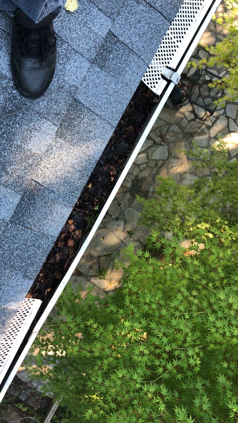Gutter Cleaning by American Home Contractors