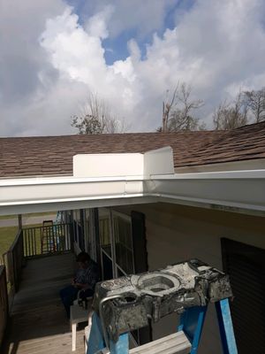 Gutter Installation using White Seamless Gutters