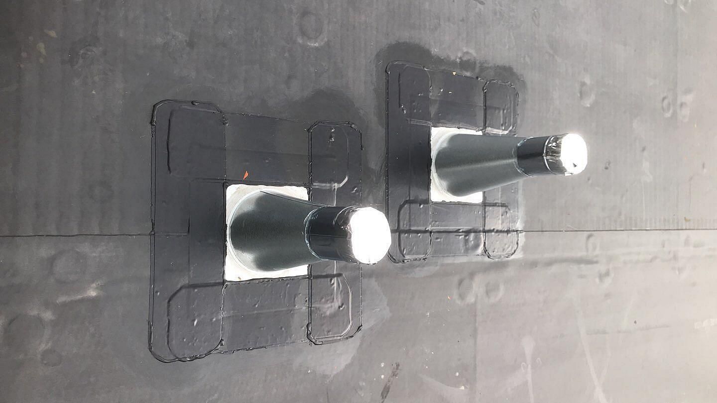 Commercial Roofing Installation using EPDM with white gutters by A Plus Exterior