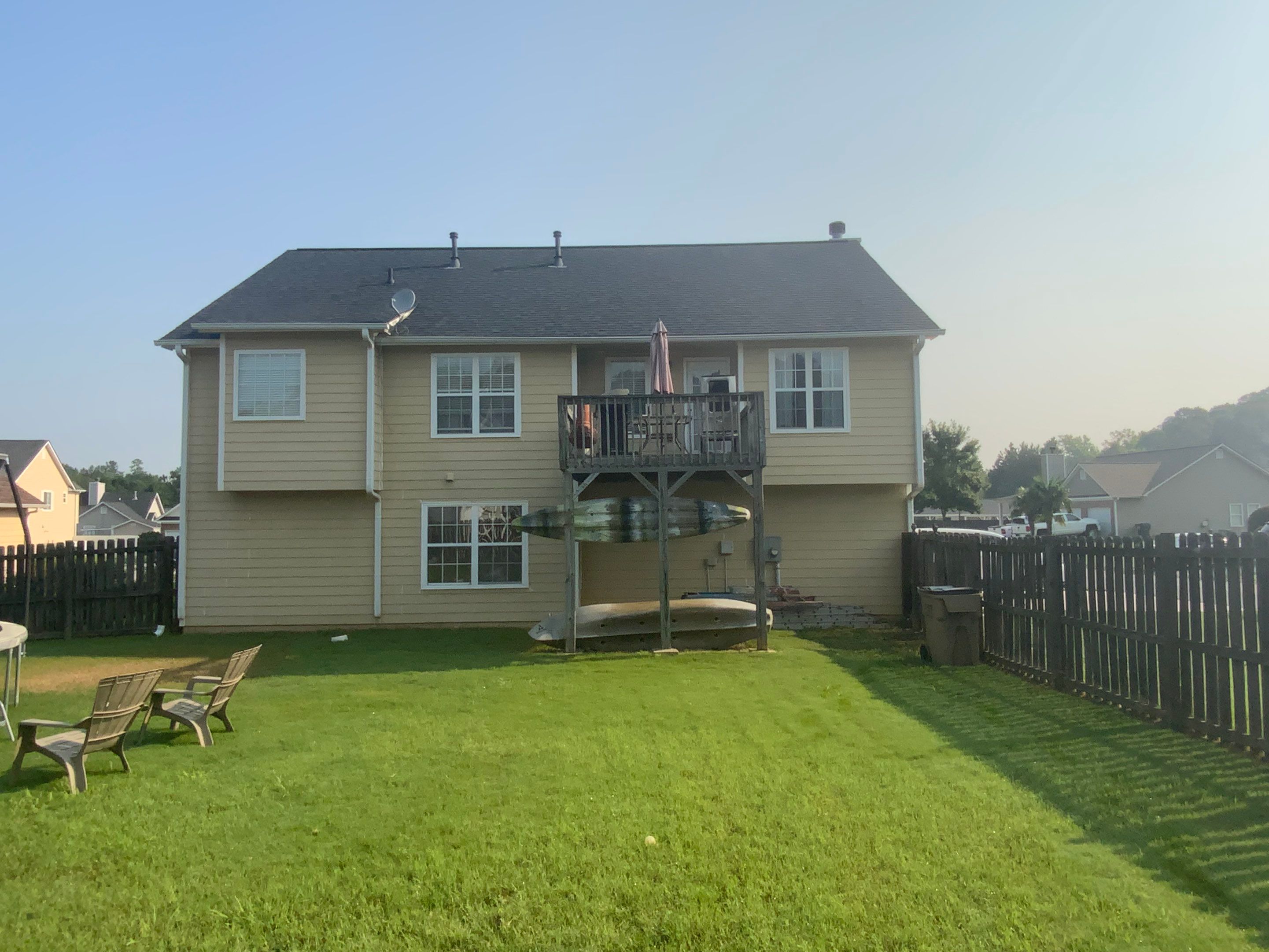 Comprehensive Exterior Painting for Cartersville Home with Blue Siding Transformation by Swift Home Renovations