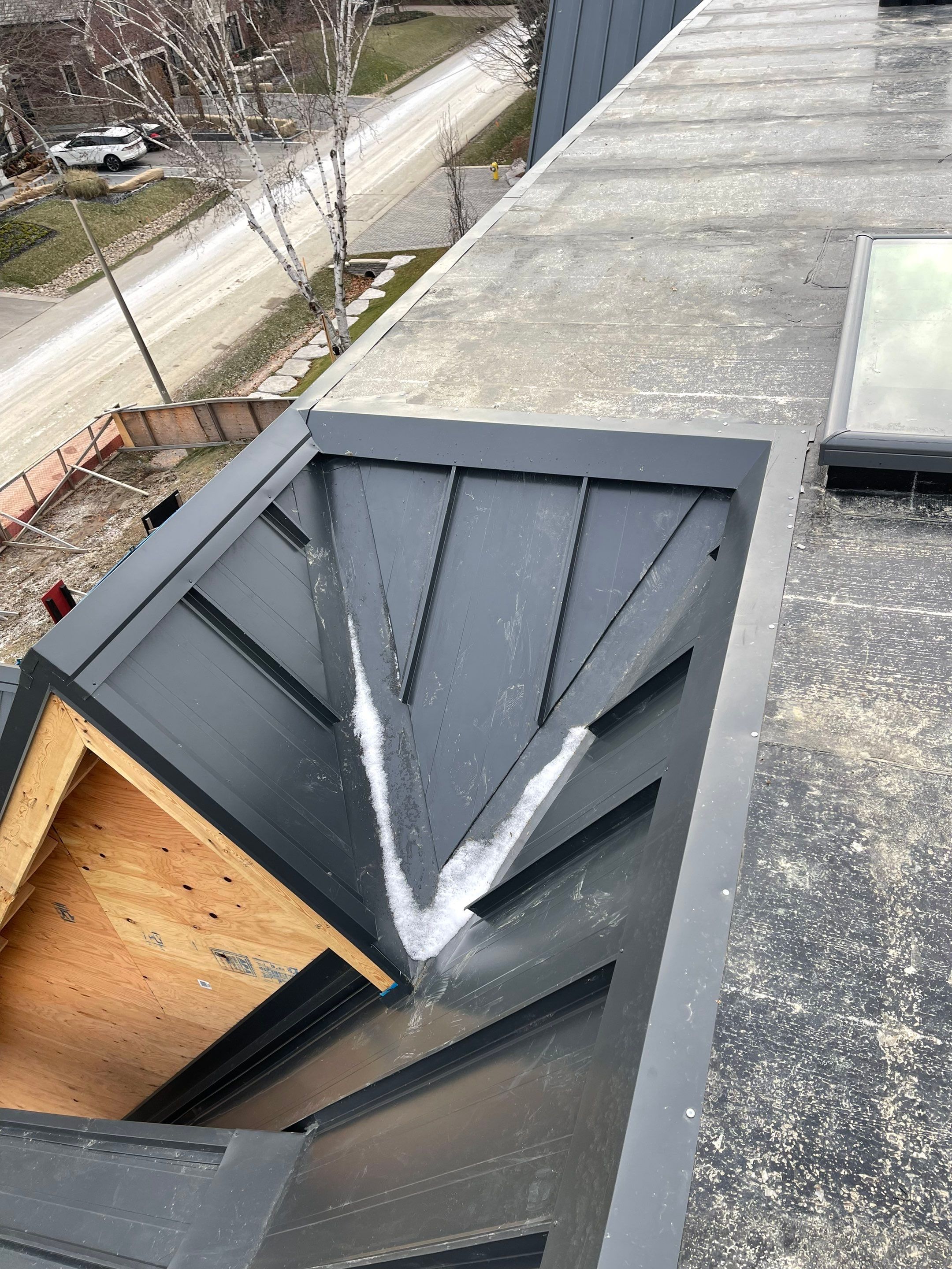New Home Construction using 16" Standing Seam Panels by Jay Carter Roofing & Sheet Metal