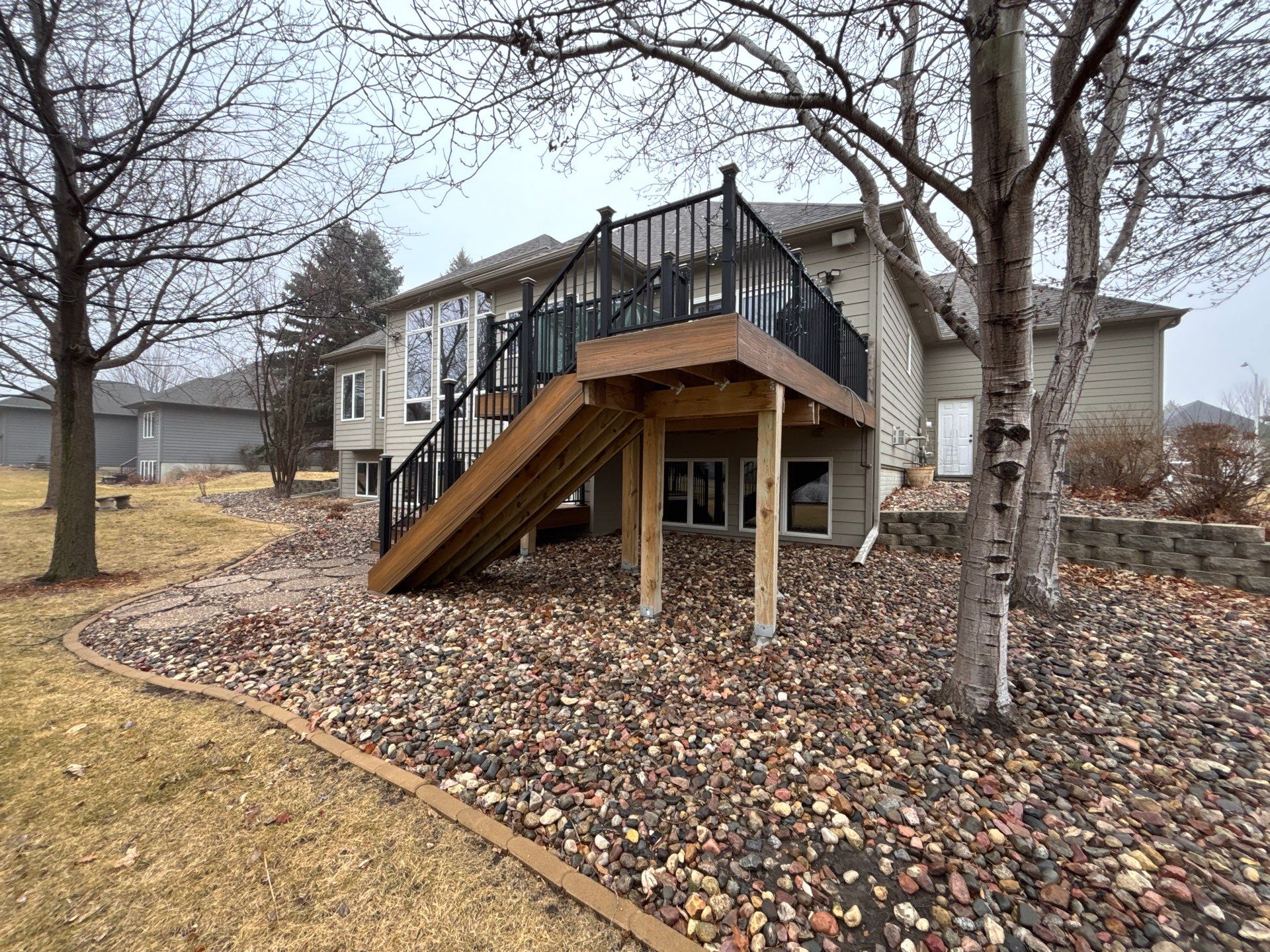 Sioux Falls Concrete Driveway Replacement and Custom Front Walkway by Select Painting, Coatings & Garage Cabinets
