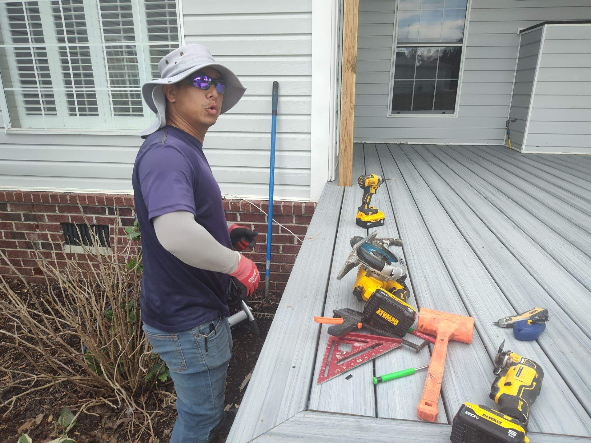 Outside porch and concreate work by Cornerstone Home Builders, LLC