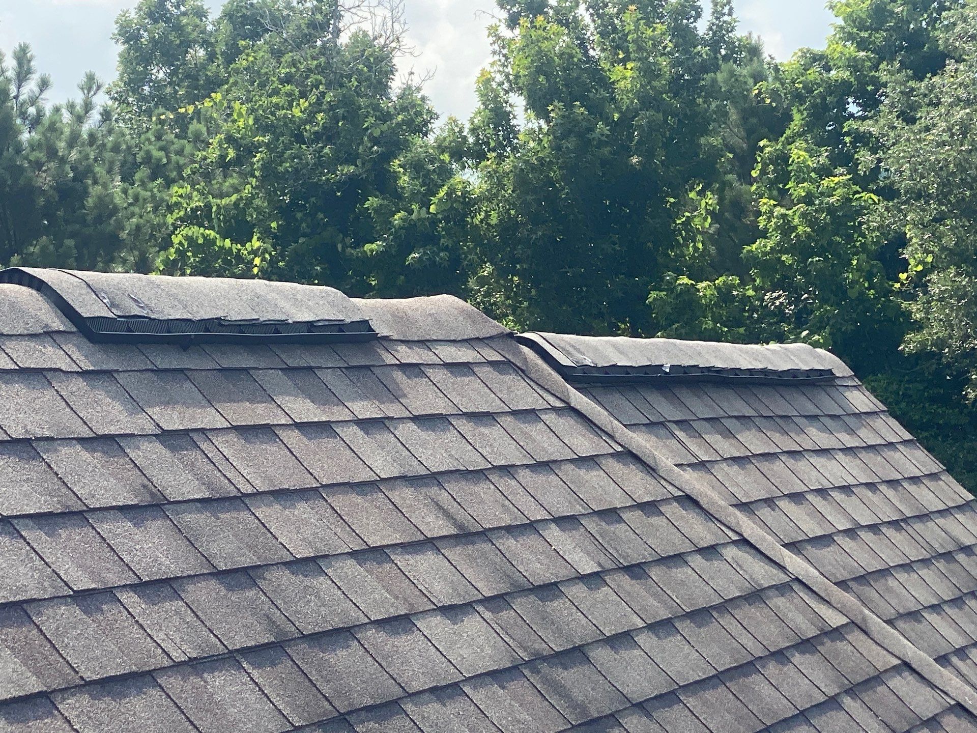 Hail Damage using Owen's Corning Duration (Lifetime) Shingles by Roof Repair Company