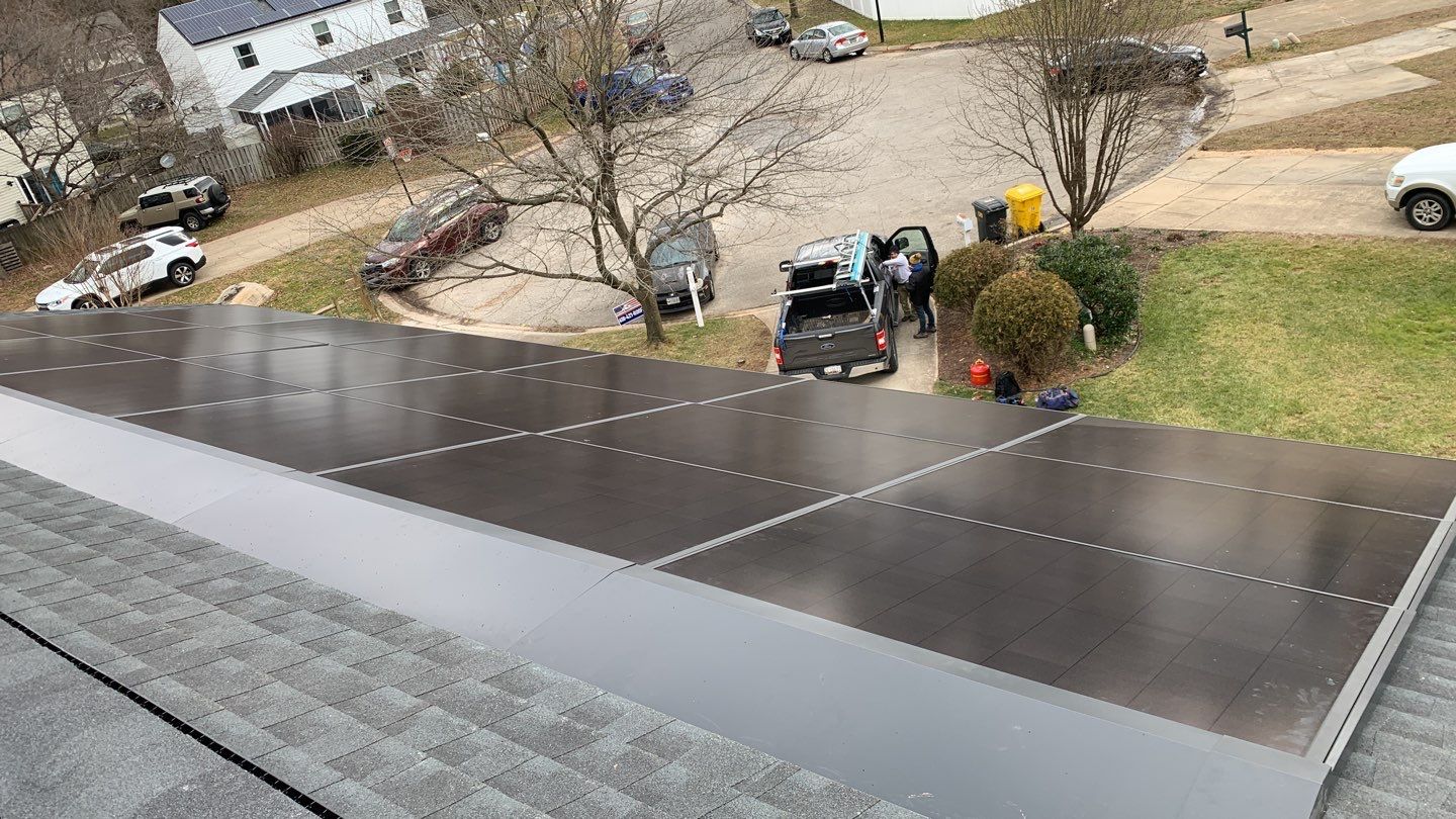 Roof Replacement with GAF Decotech integrated solar panels by American Home Contractors