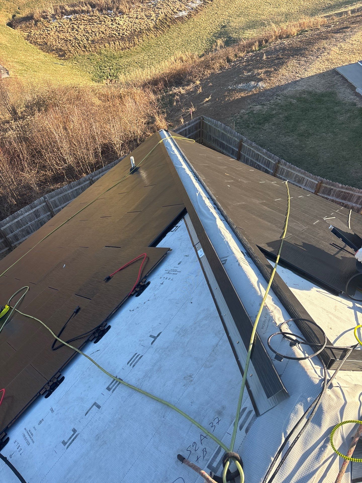 Winter Tesla Solar Roof Installation! by American Home Contractors