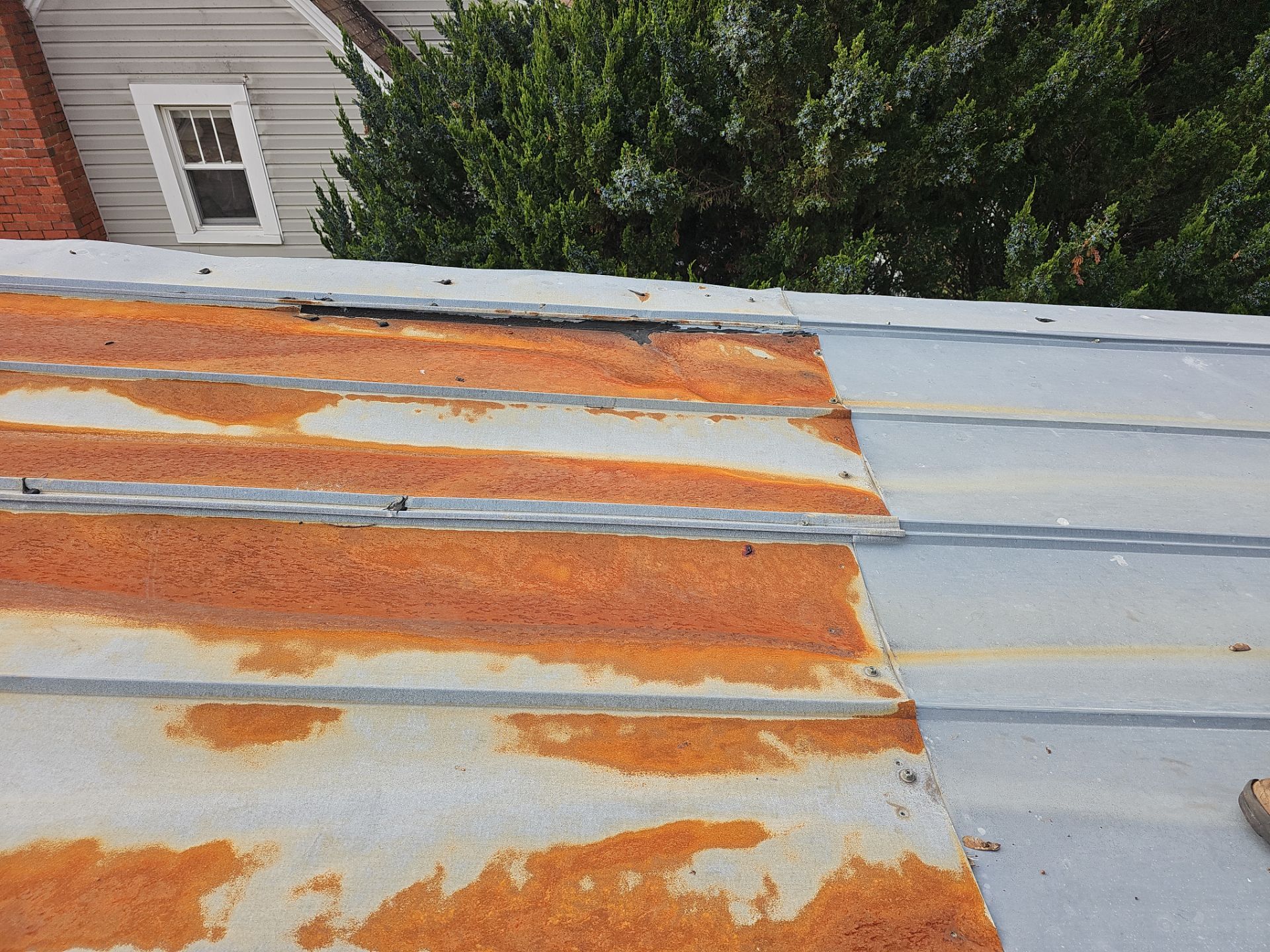 Metal Roof Replacement and Repair by Winchester Roofing