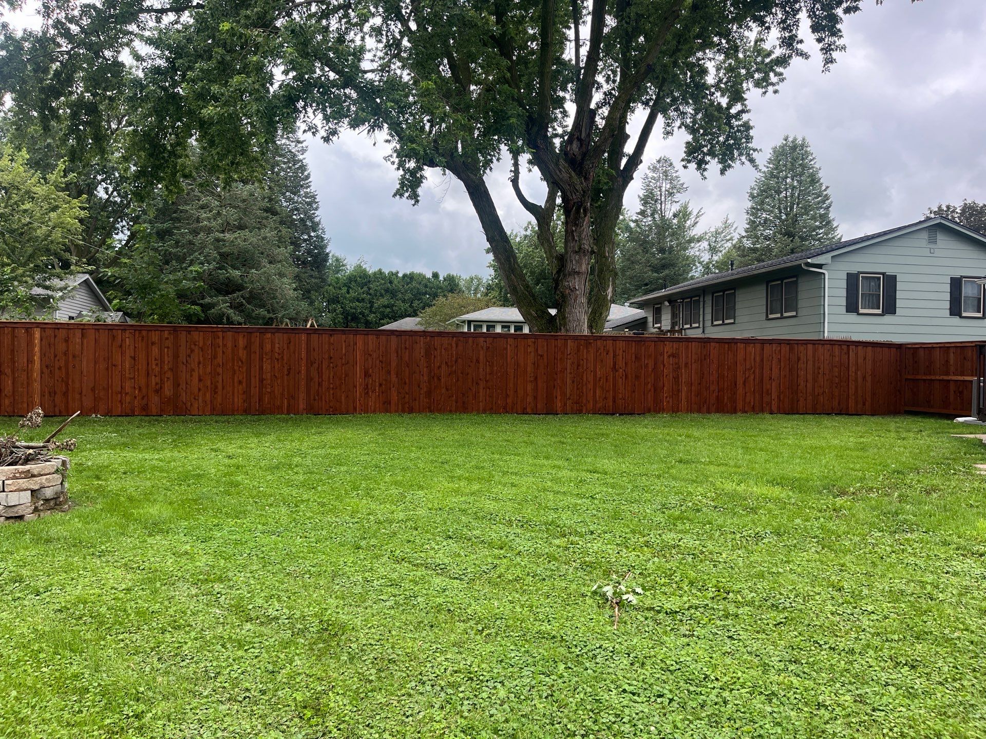 Board on Board Wood Privacy Fence Installation in Cedar Falls by Perfect Picket Fence and Stain