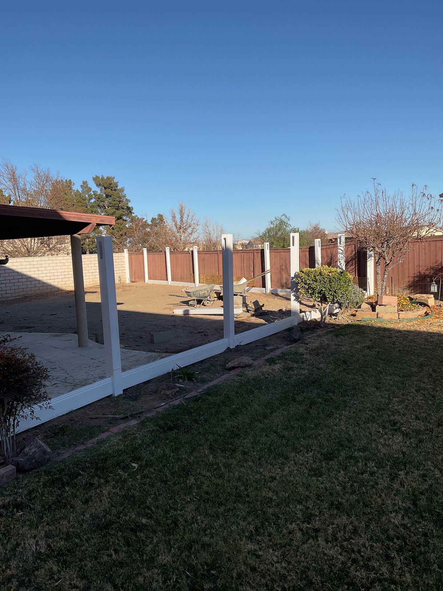 Fence installation using wood by Fence Guys Inc.