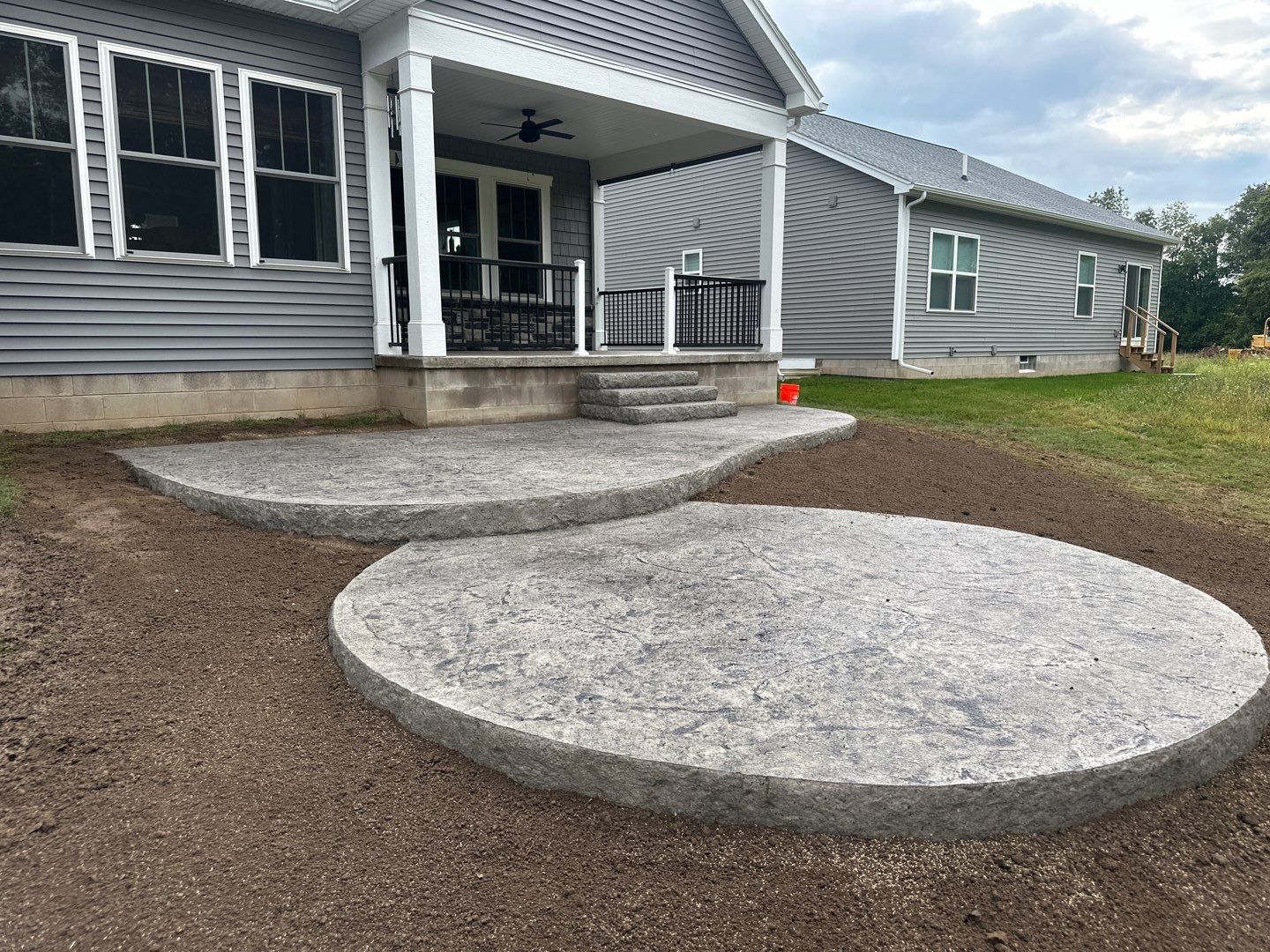 Heavystone Textured Stamped Patio  by NG Masonry & Construction LLC