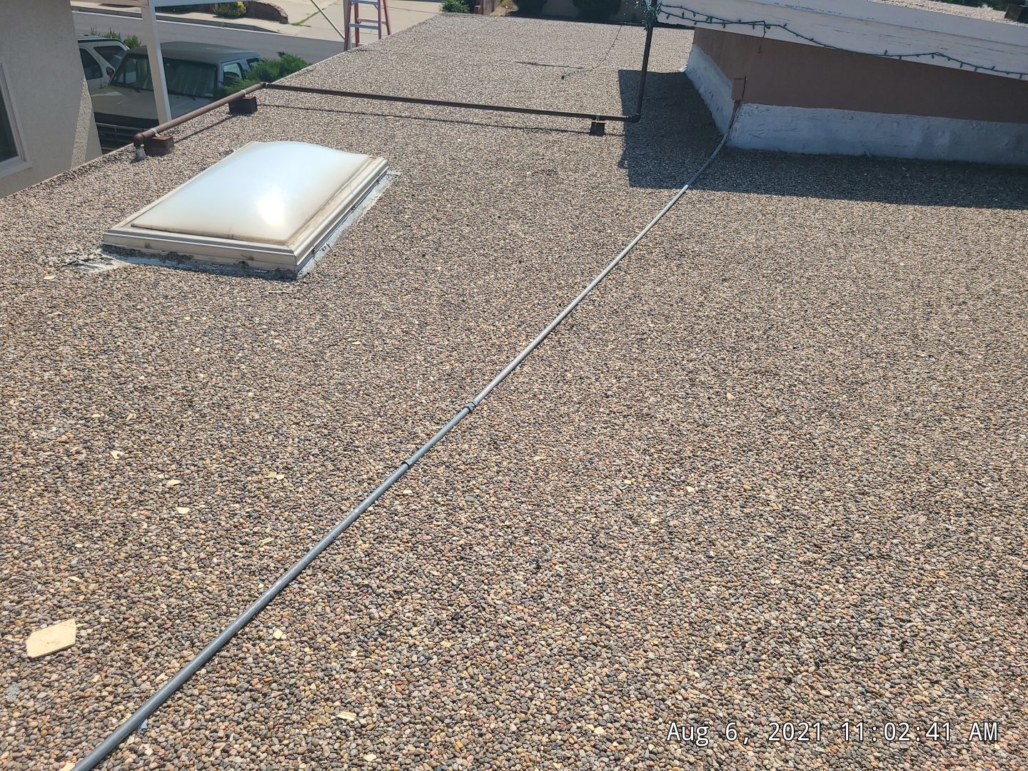Residential TPO Roof Replacement and skylight replacement in Albuquerque by Doyle Roof Masters Inc