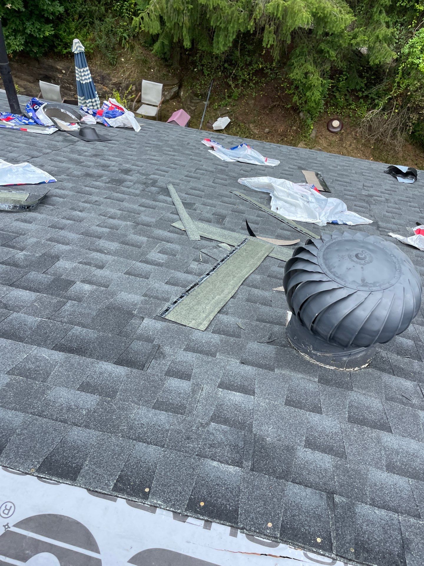 Residential Roofing Installation using GAF Timberline HDZ Charcoal by Rainstoppers Roofing