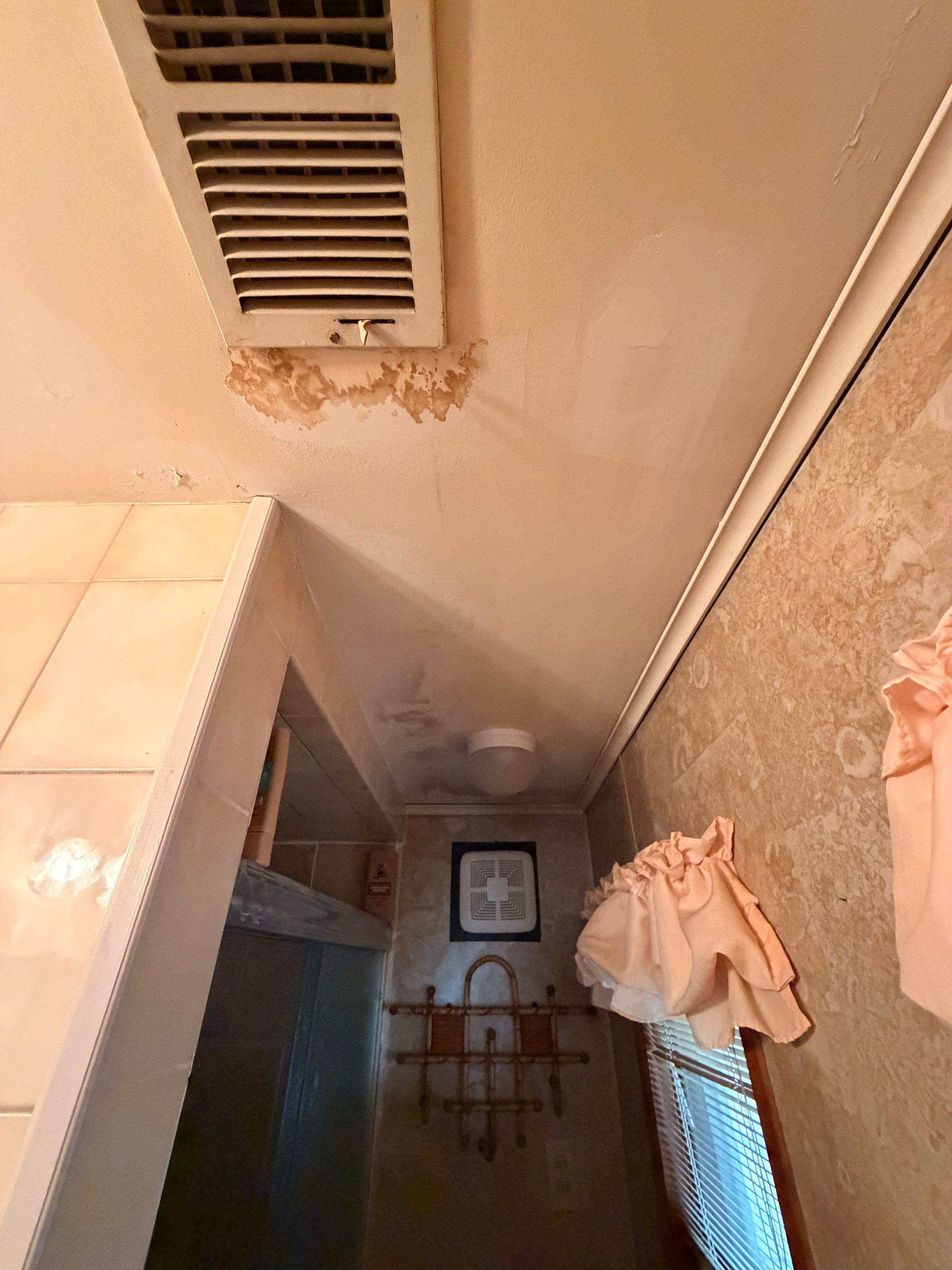 Water Damage bathroom in West Islip by Newhouse Restoration