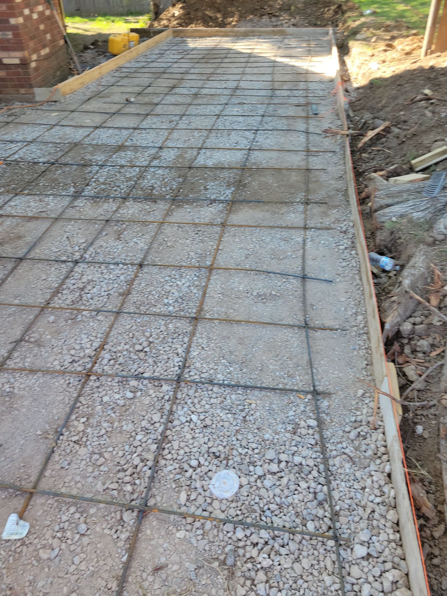 Concrete Driveway and Fence by Clays Services Inc